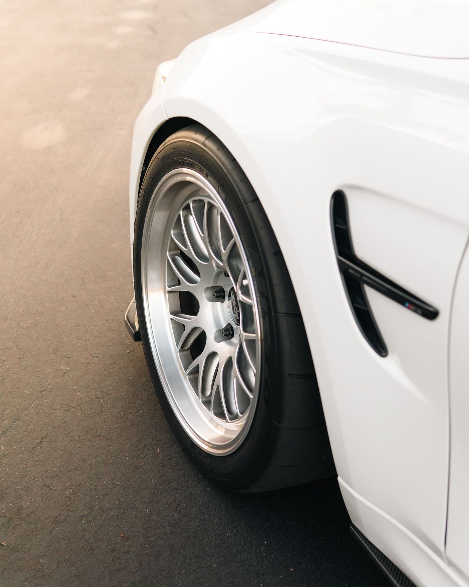 White BMW F80 M3 with 18" ML-10RT Apex wheels in Machined Lip Race Silver