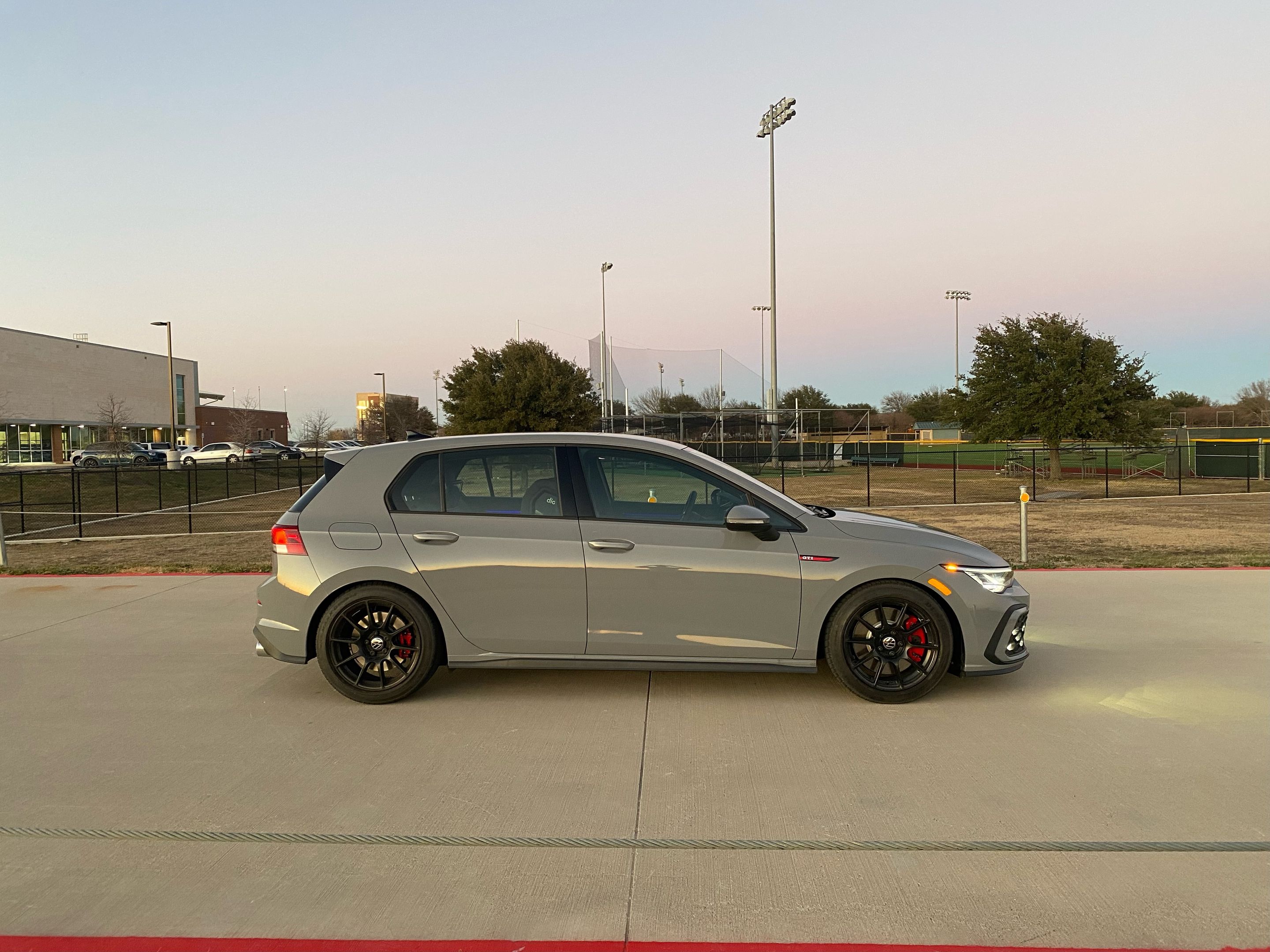 Grey VW MK8 Golf with 17" SM-10 Apex wheels in Satin Black