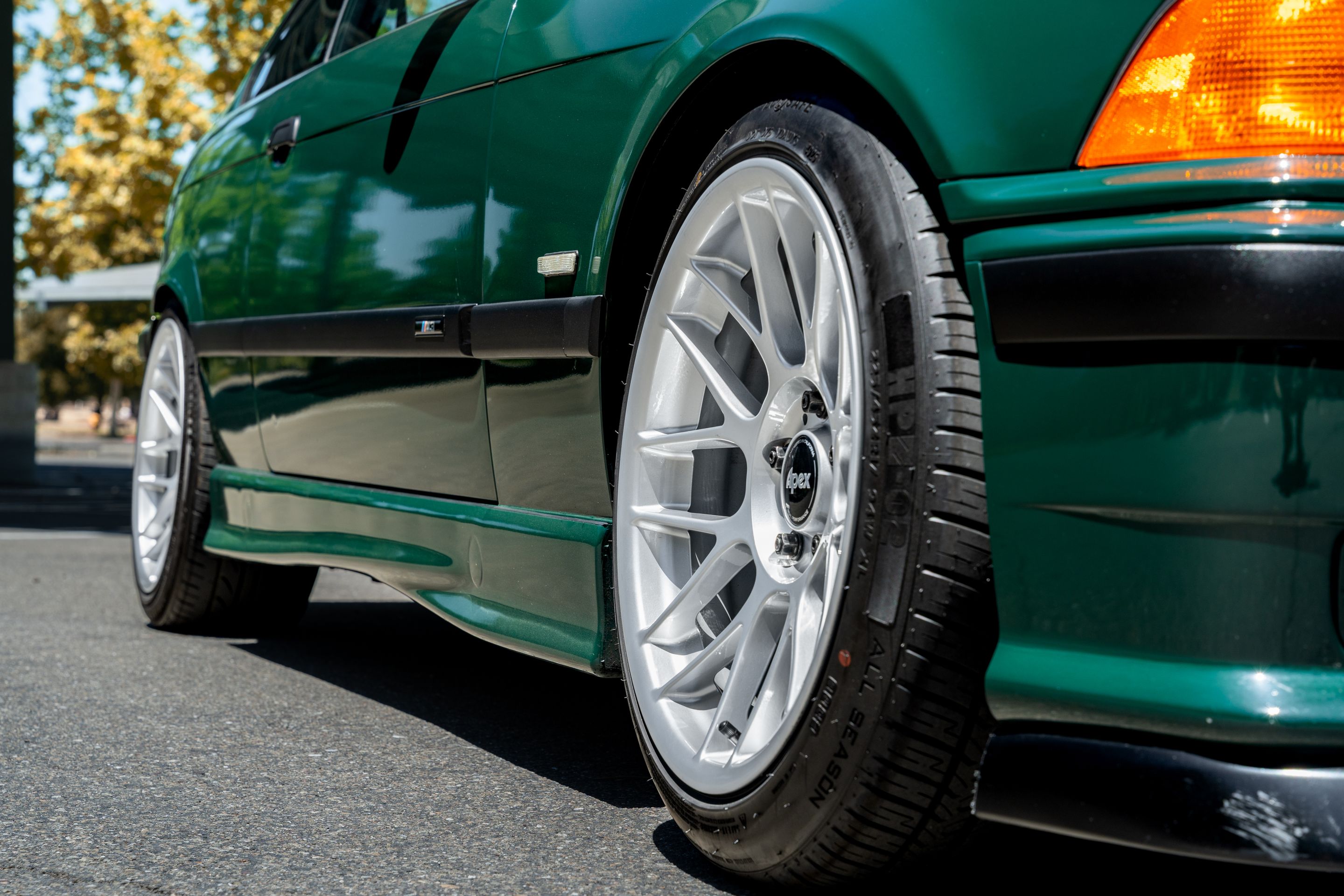 Green BMW E36 M3 with 17" ARC-8 Apex wheels in Race Silver