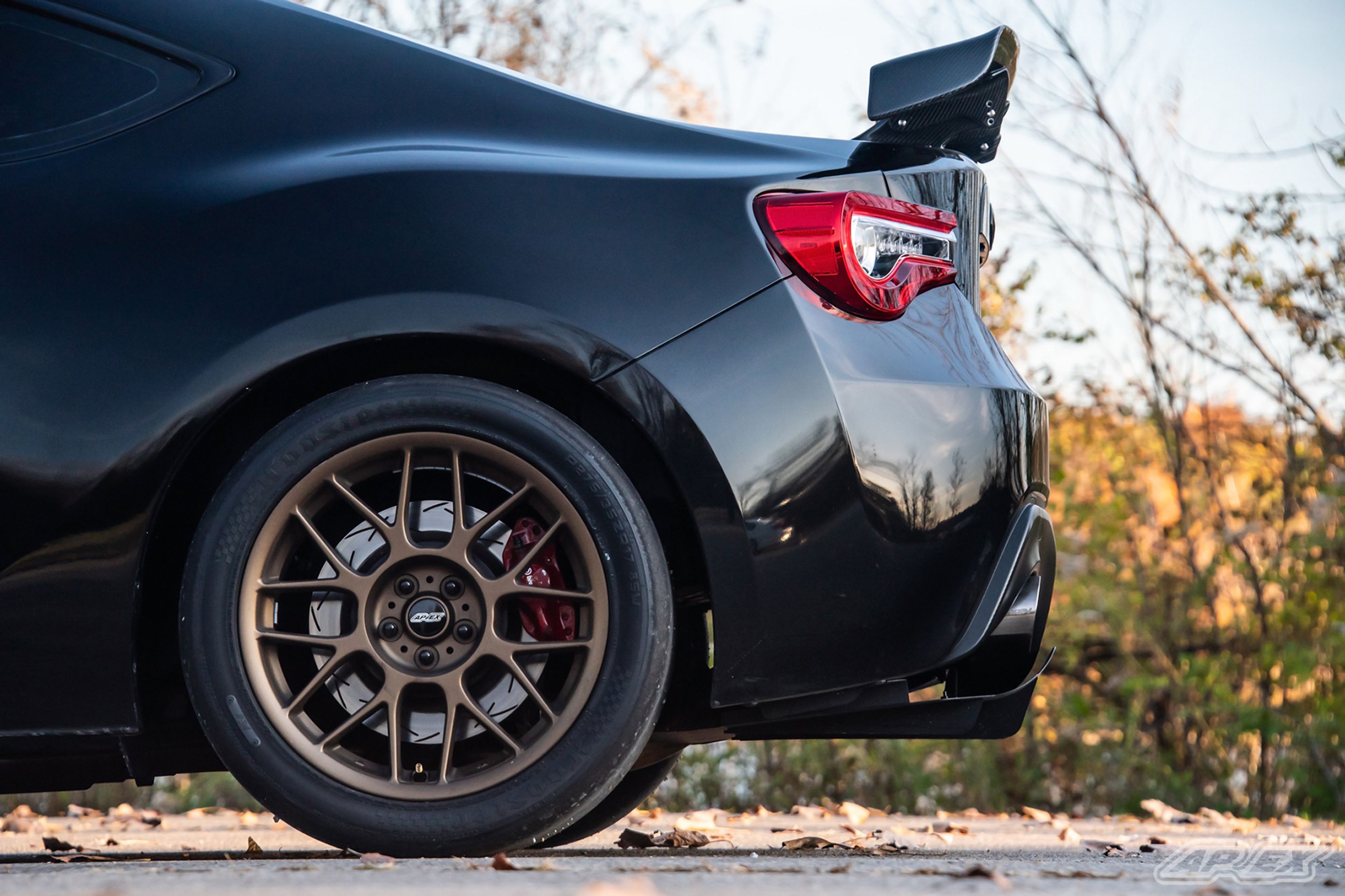Black Scion FR-S with 17" ARC-8 Apex wheels in Satin Bronze