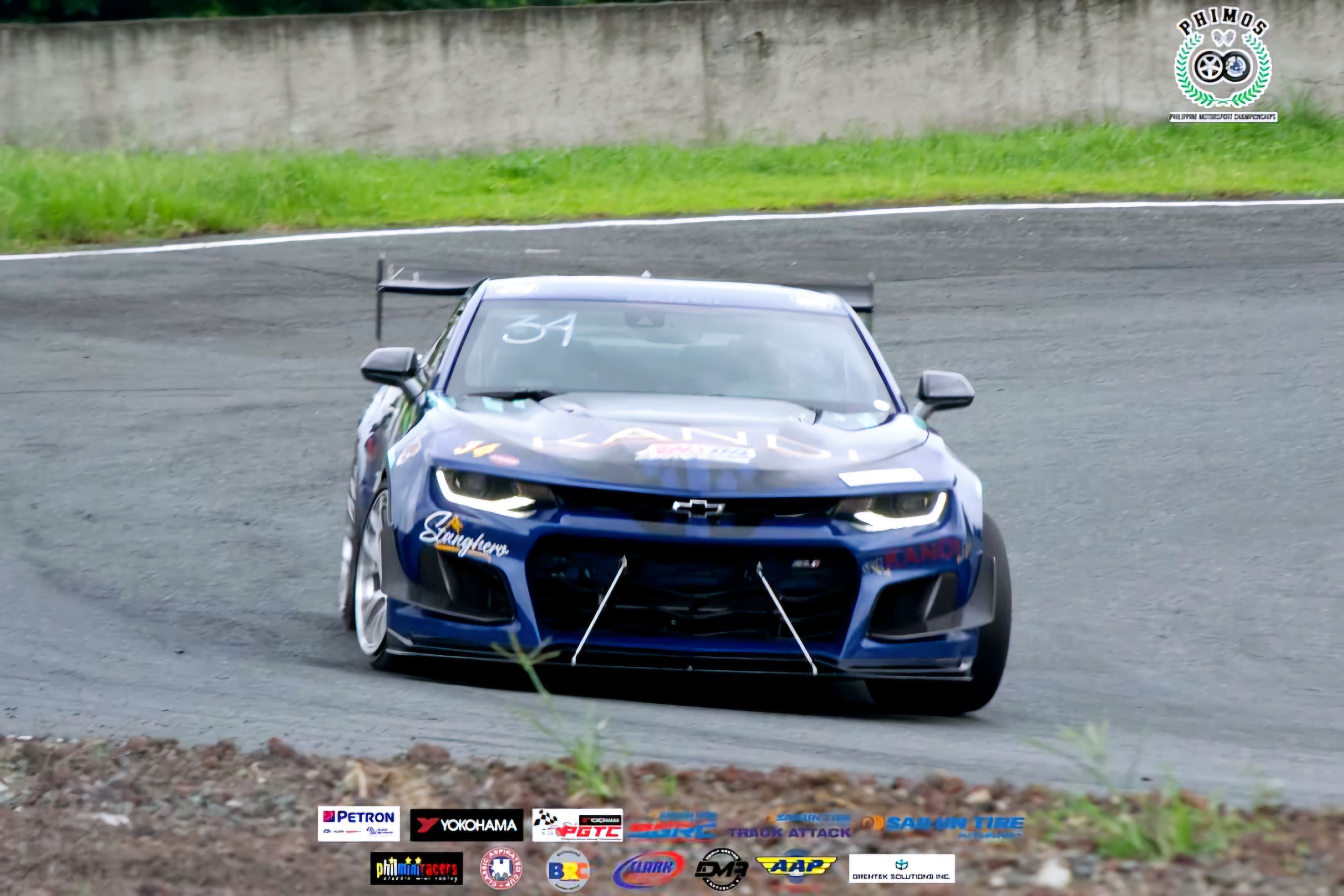 Blue Chevrolet 6th Gen Camaro ZL1 with 19" EC-7RS Apex wheels in Brushed Clear