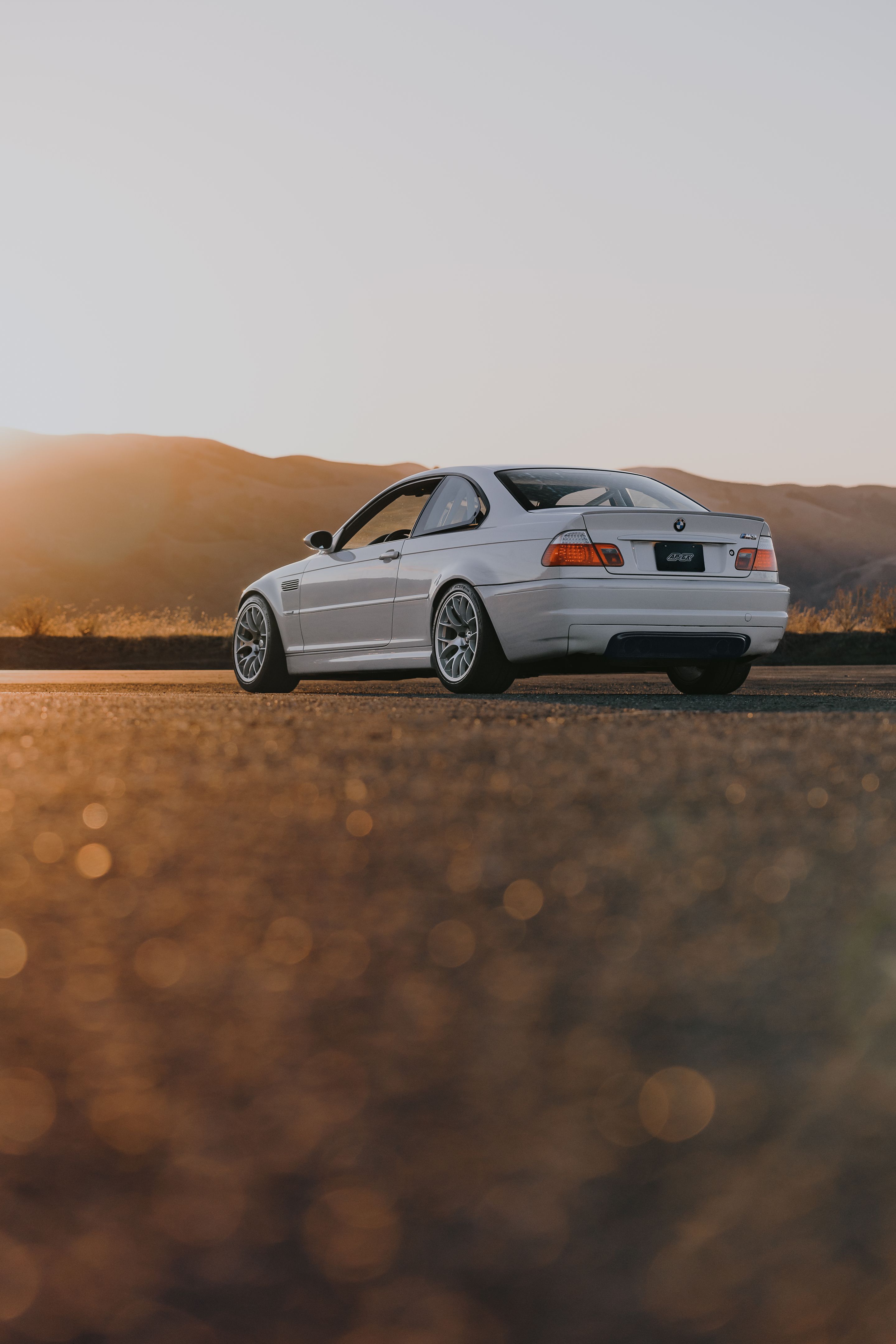 White BMW E46 M3 with 18" EC-7 Apex wheels in Race Silver