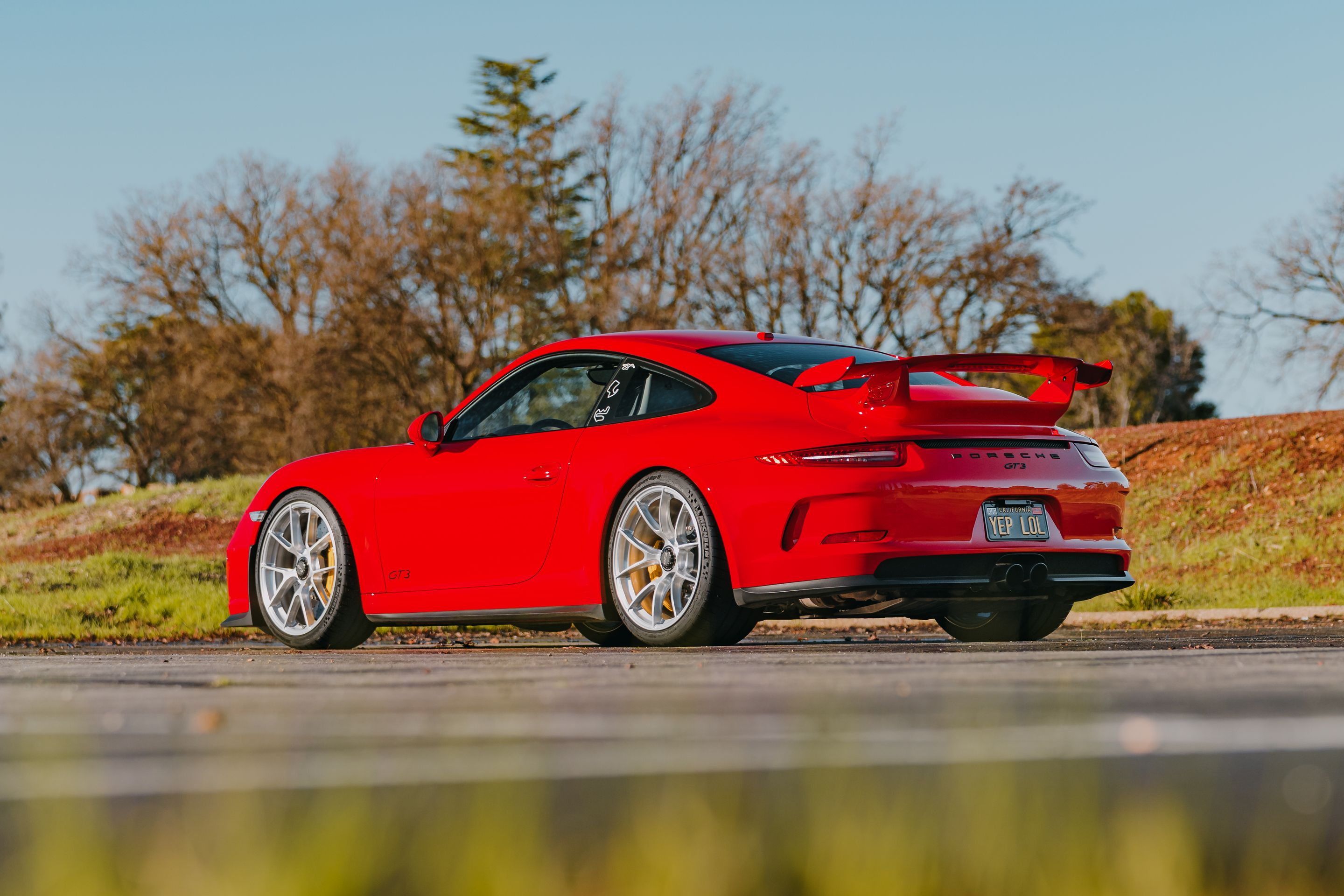 Red Porsche 911 991.1 GT3 with 20" VS-5RS Apex wheels in Brushed Clear