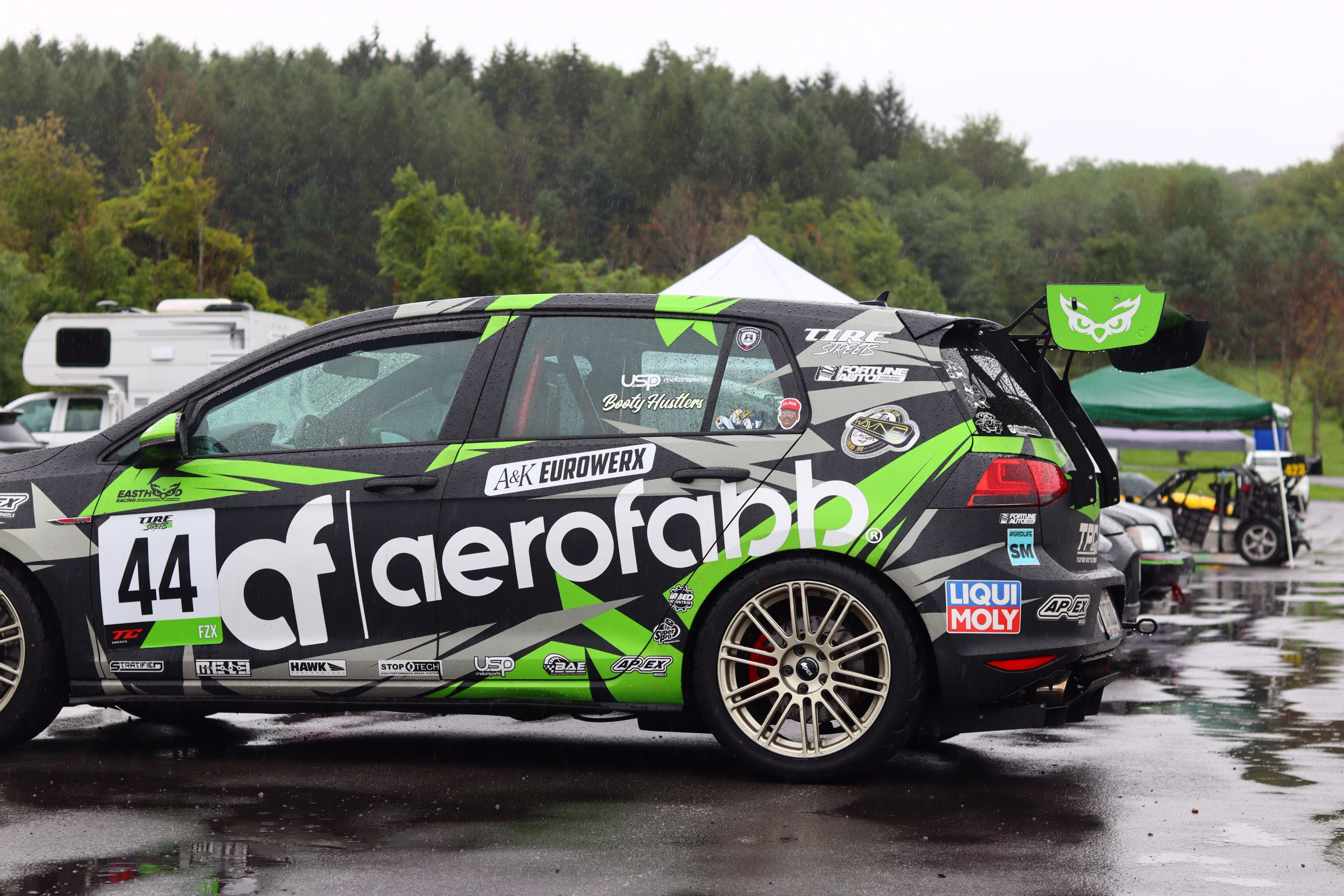 Race Livery VW MK7 GTI with 18" TC-10RT Apex wheels in Motorsport Gold