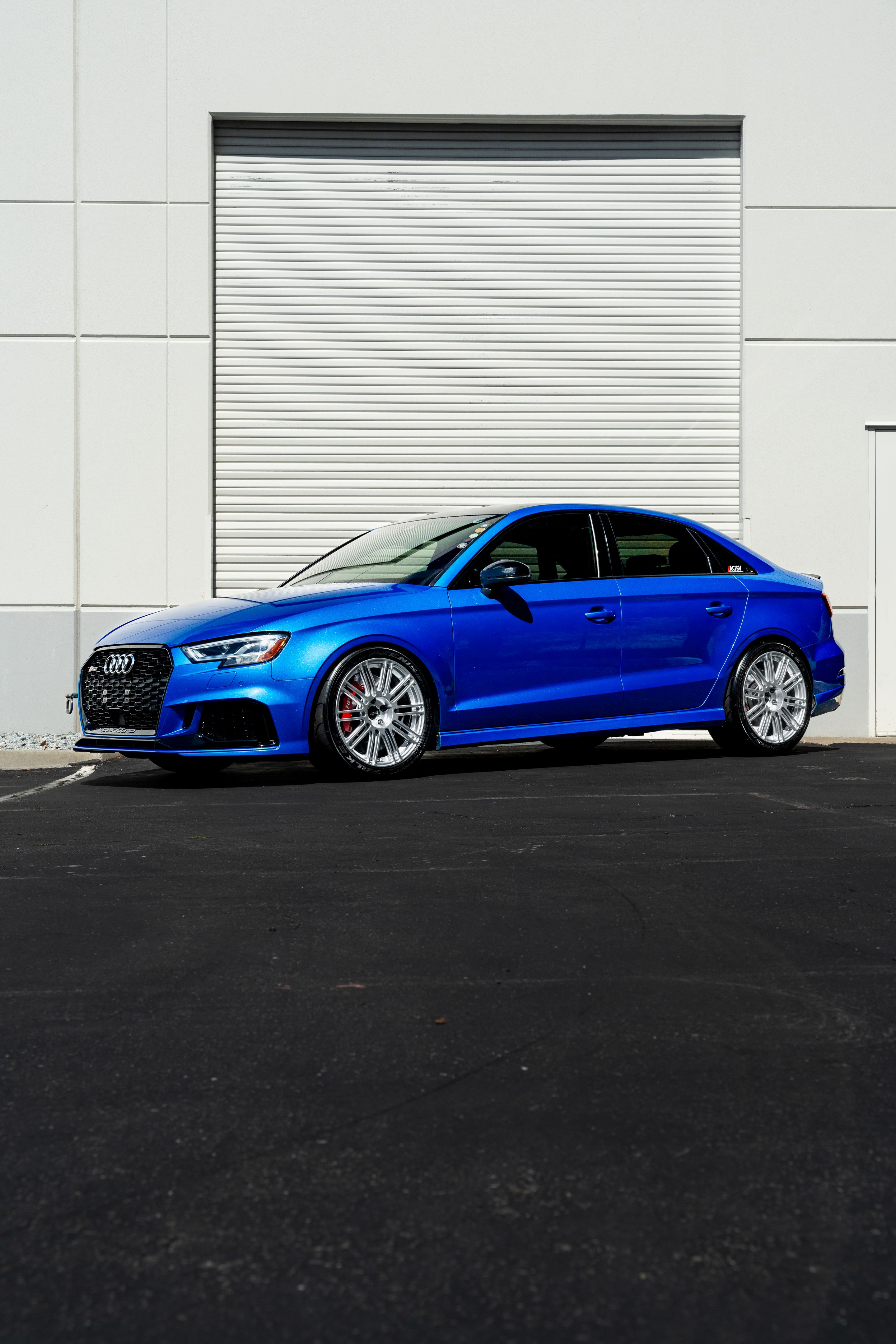 Blue Audi 8V RS 3 with 18" TC-10RT Apex wheels in Race Silver