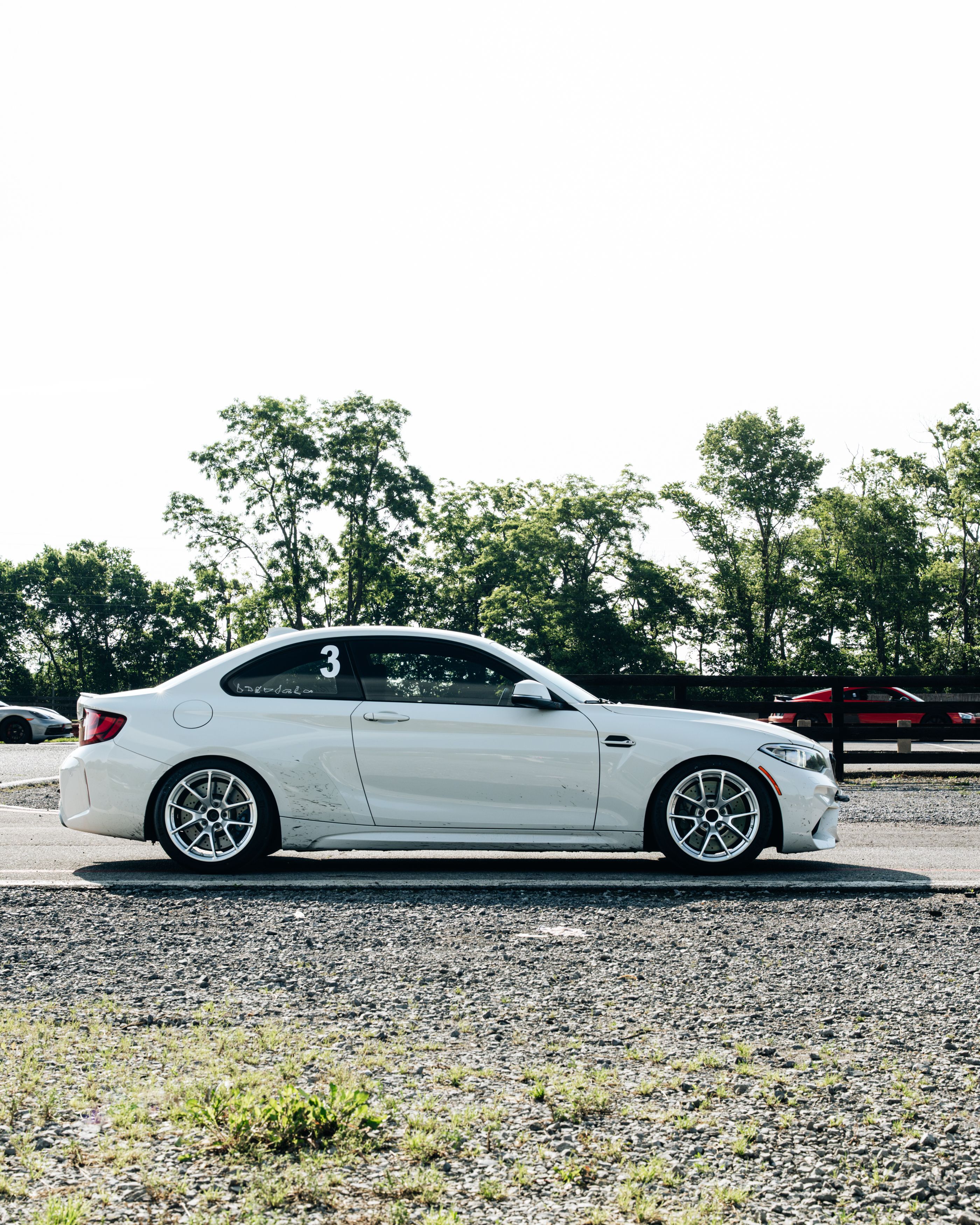 White BMW F87 M2 with 18" VS-5RE Apex wheels in Anthracite