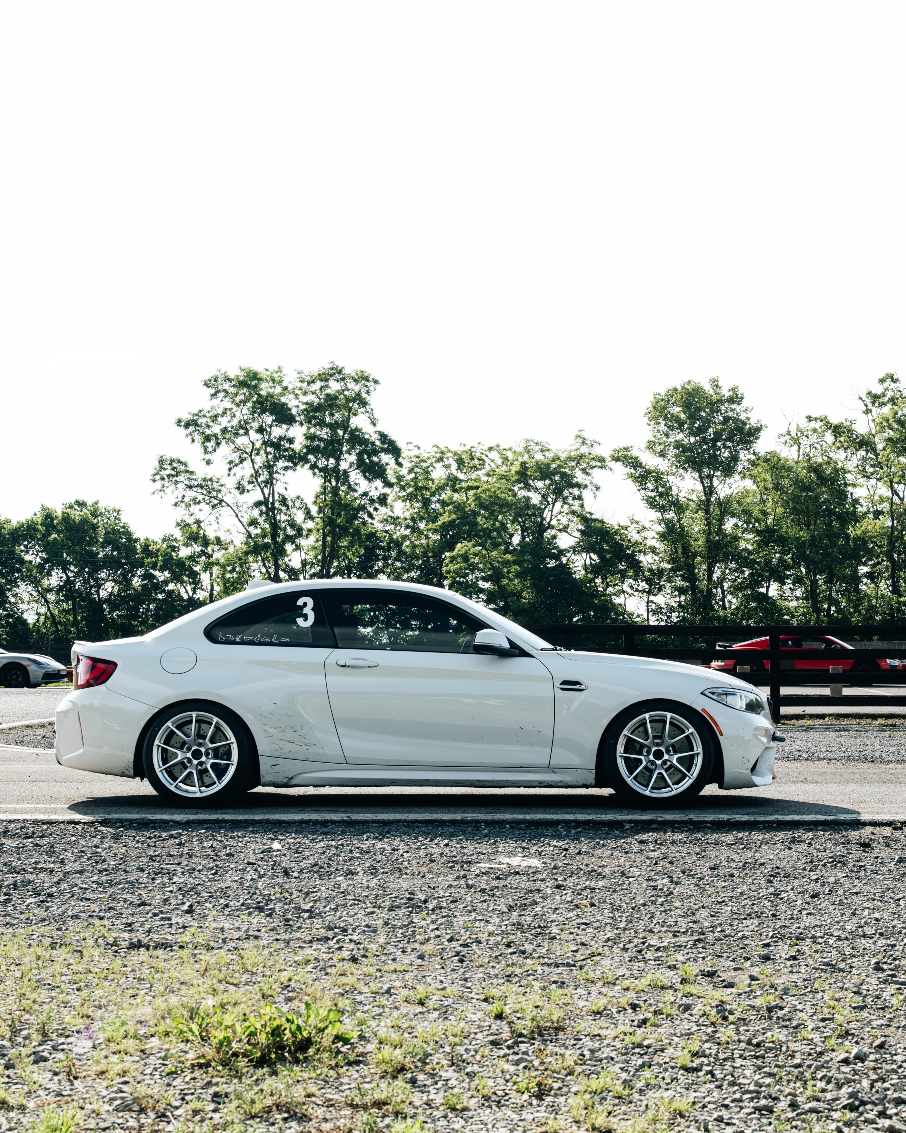White BMW F87 M2 with 18" VS-5RE Apex wheels in Anthracite