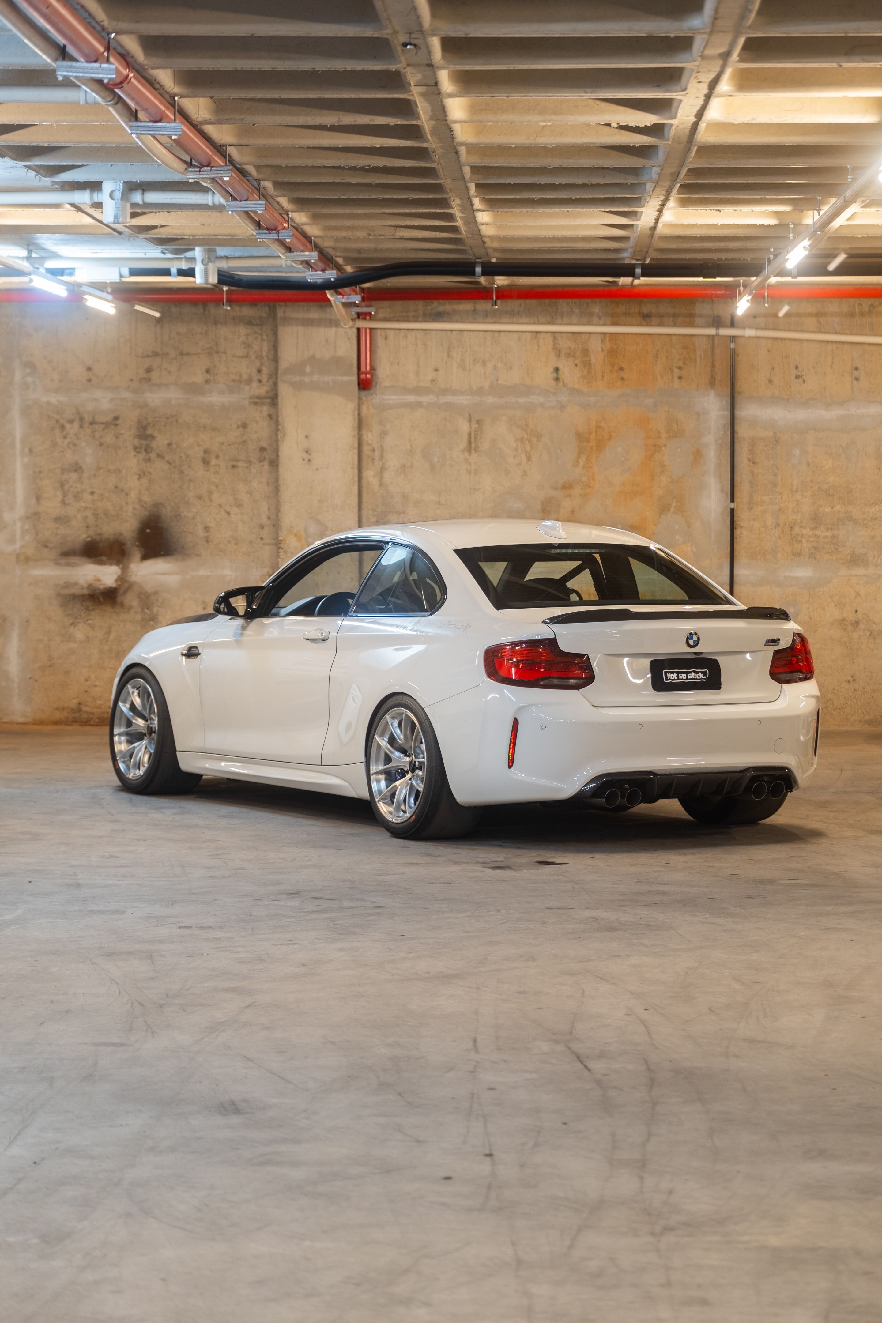 White BMW F87 M2 with 18" VS-5RS Apex wheels in Brushed Clear