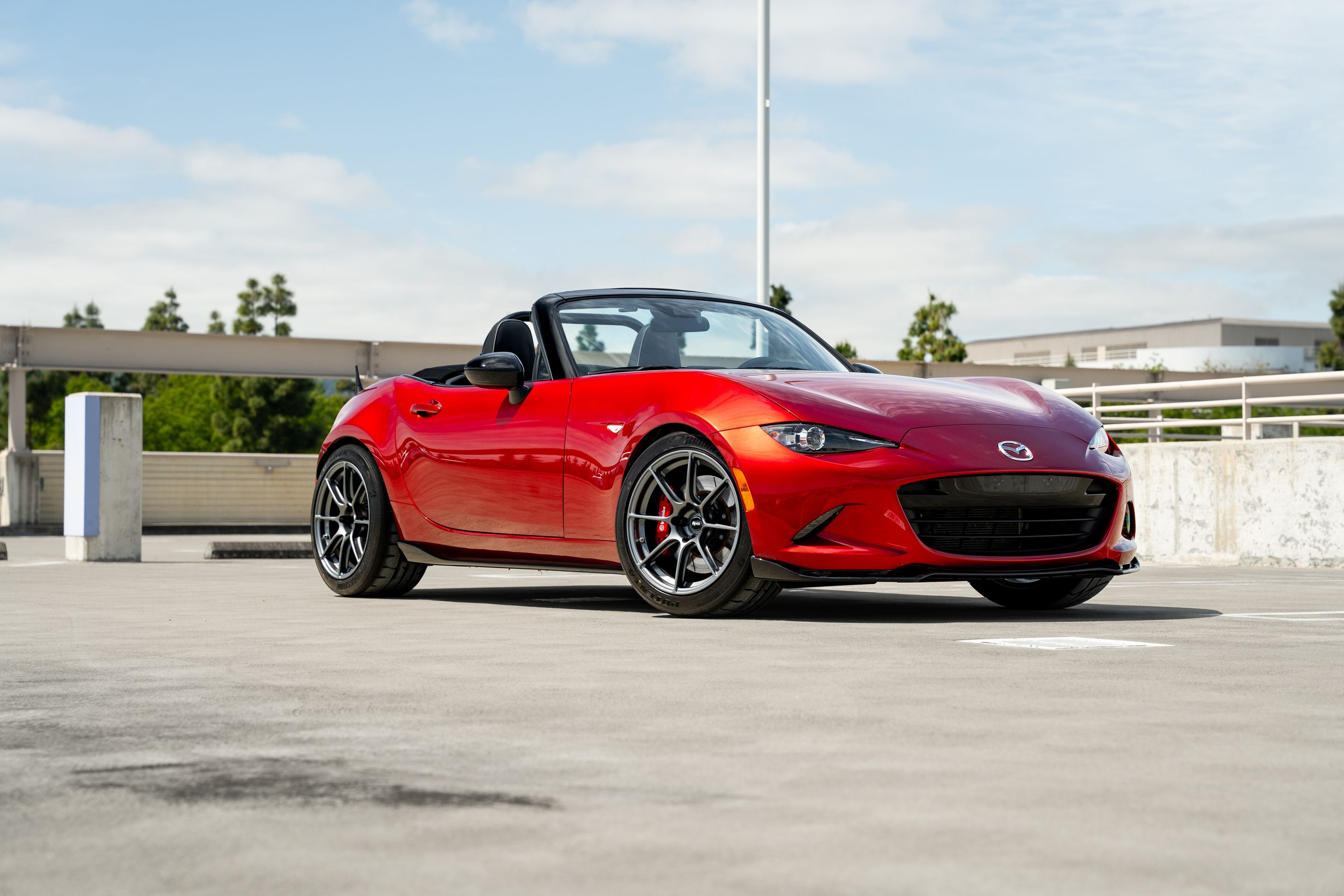 Red Mazda ND MX-5 Miata with 17" SM-8RS Apex wheels in Anthracite