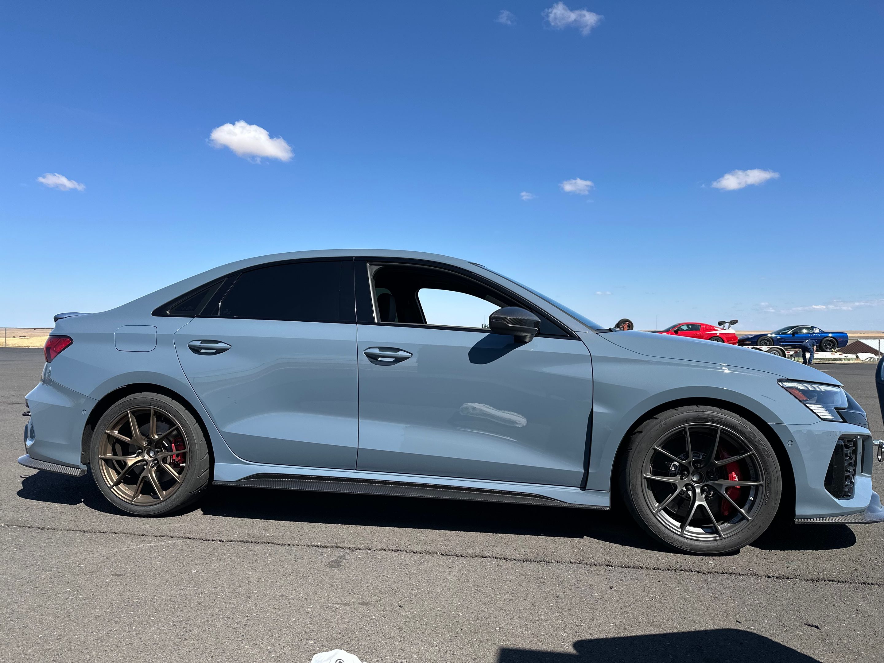 Blue Audi 8Y RS 3 with 18" VS-5RS Apex wheels in Anthracite