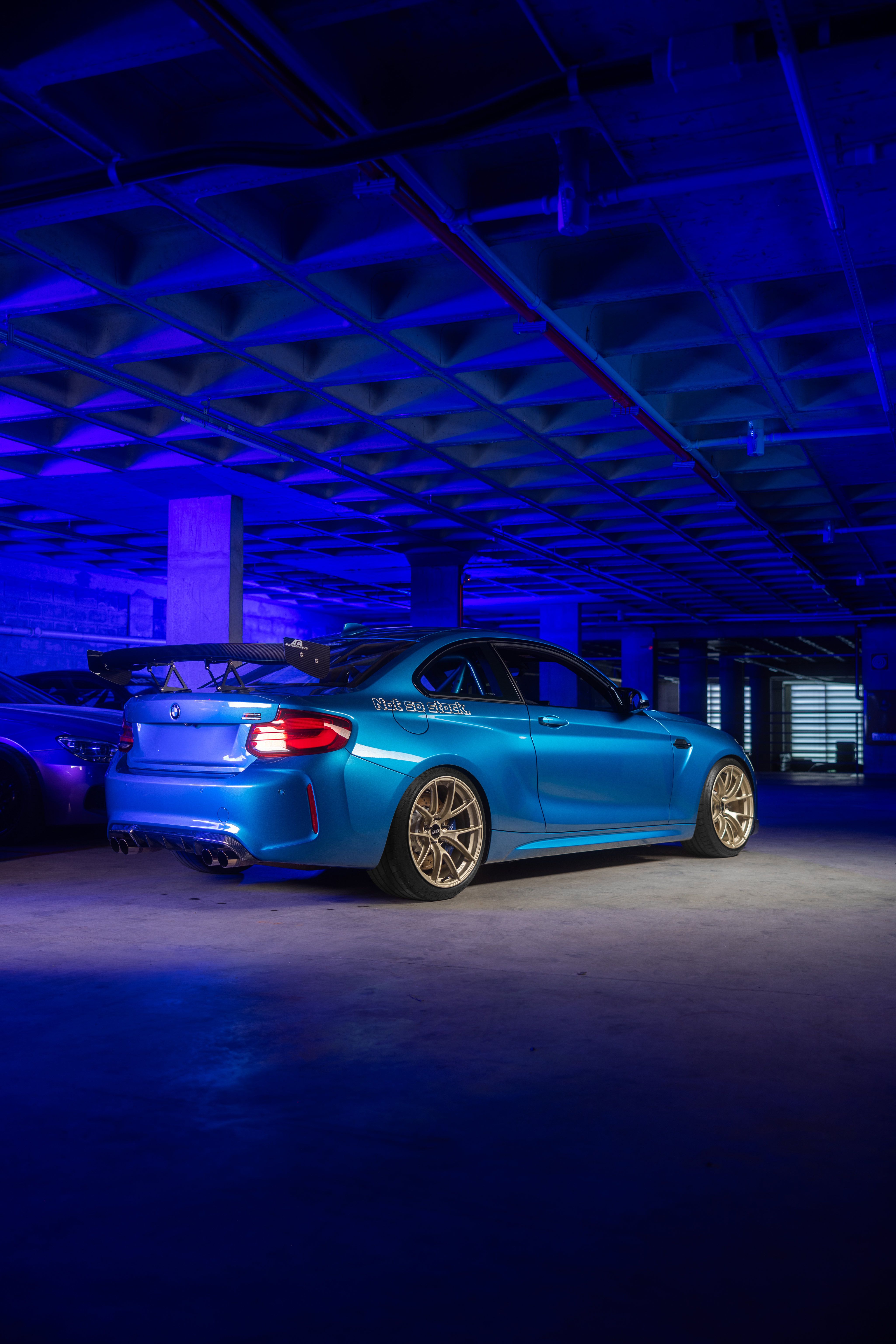 Blue BMW F87 M2 with 19" VS-5RS Apex wheels in Motorsport Gold