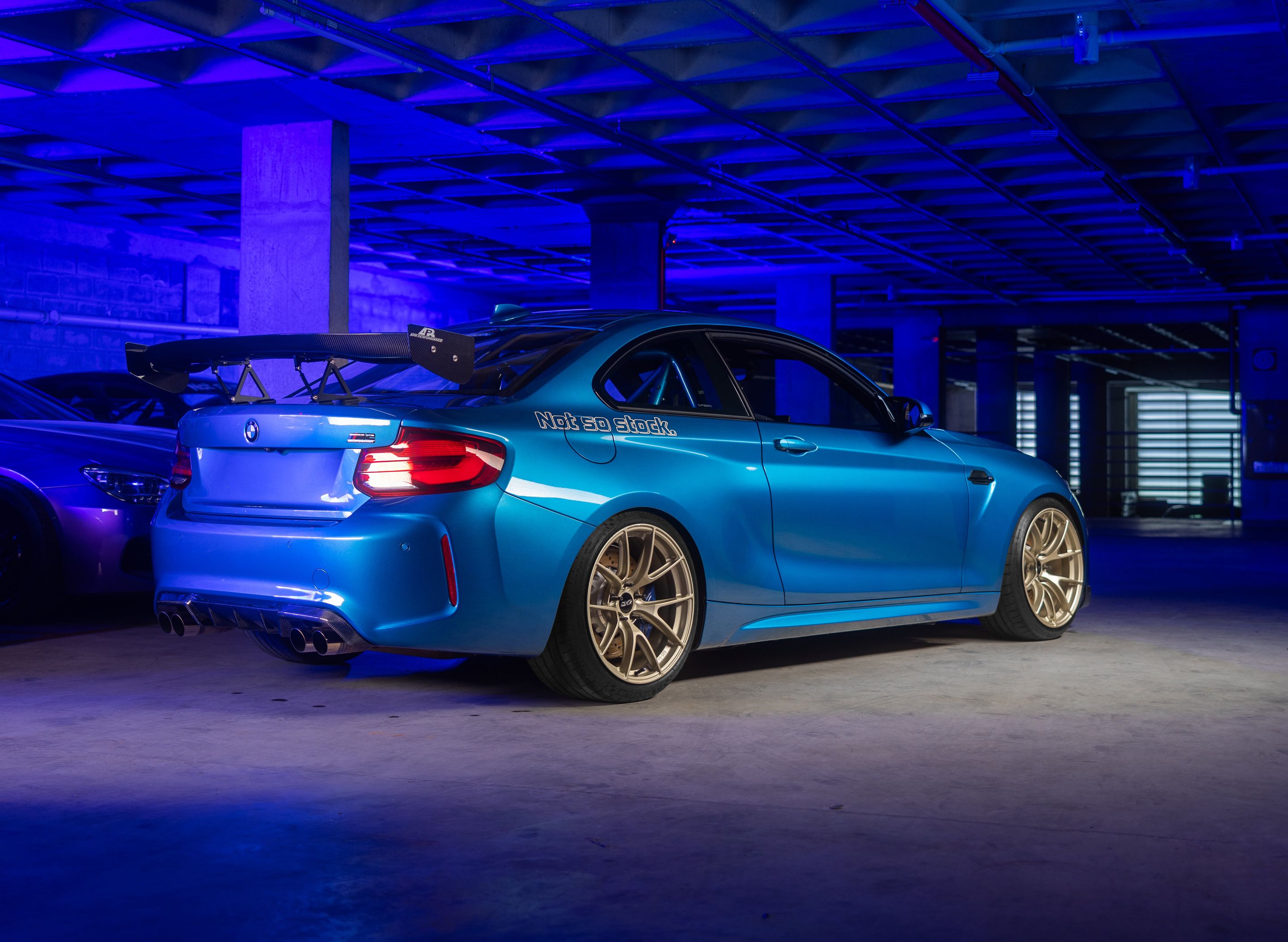 Blue BMW F87 M2 with 19" VS-5RS Apex wheels in Motorsport Gold