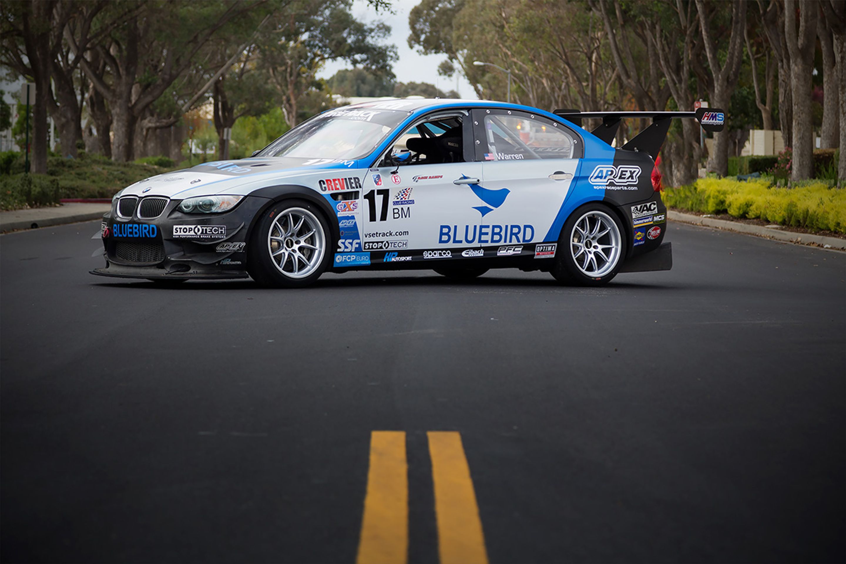 White BMW E90 Sedan M3 with 18" FL-5 Apex wheels in Race Silver