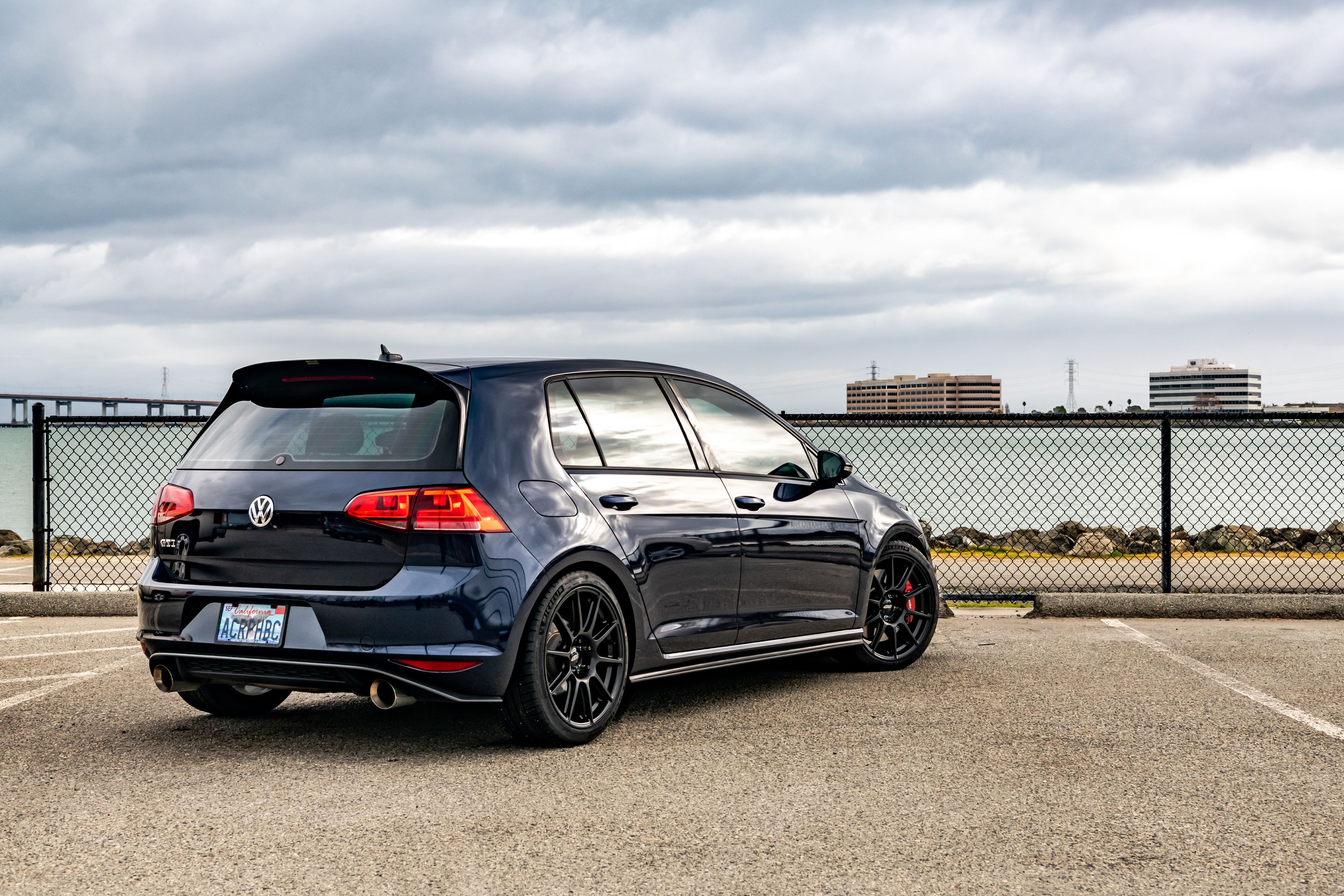 Blue VW MK7 GTI with 18" SM-10 Apex wheels in Satin Black