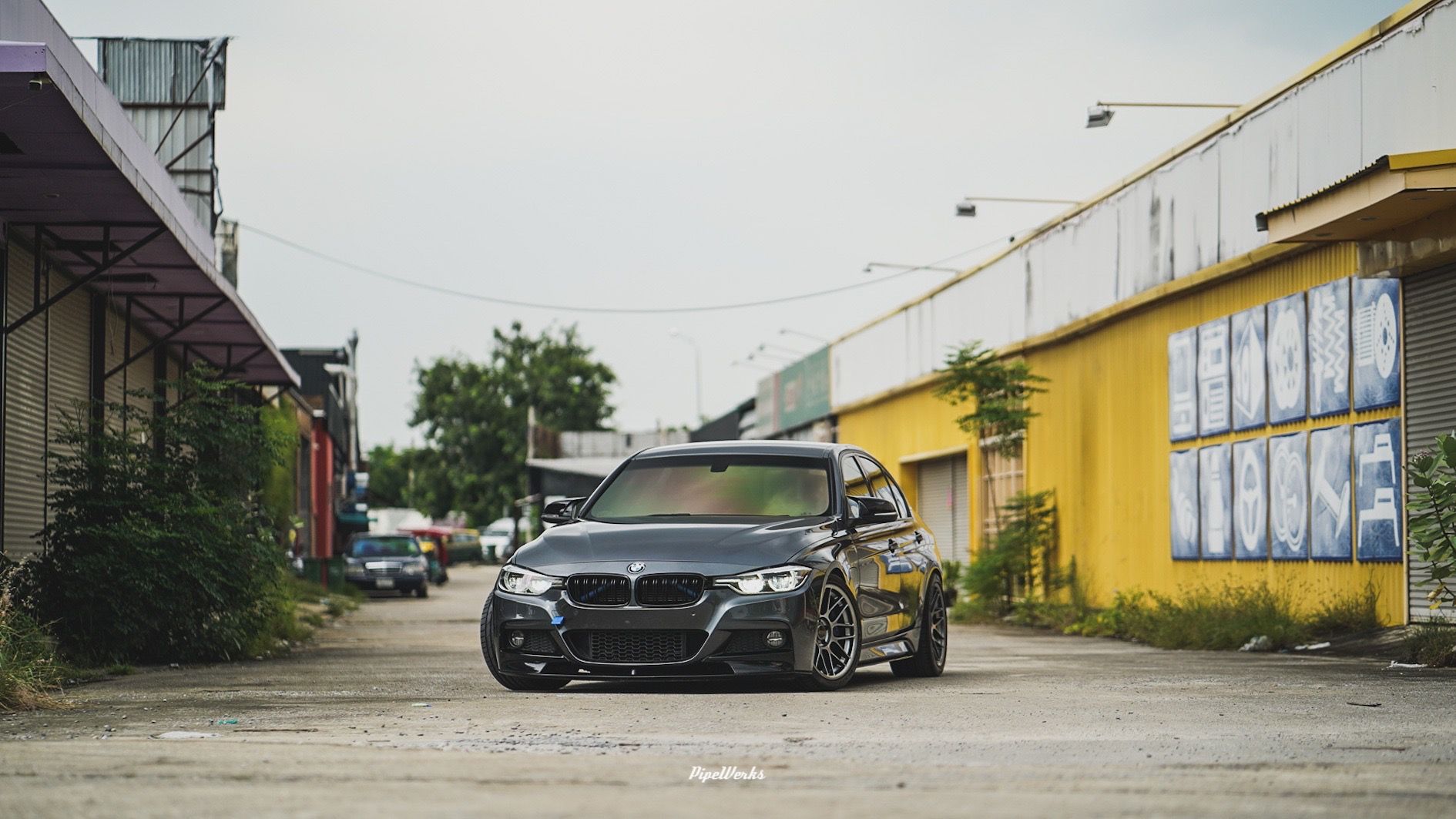 Grey BMW F30 Sedan 3 Series with 18" ARC-8 Apex wheels in Hyper Black