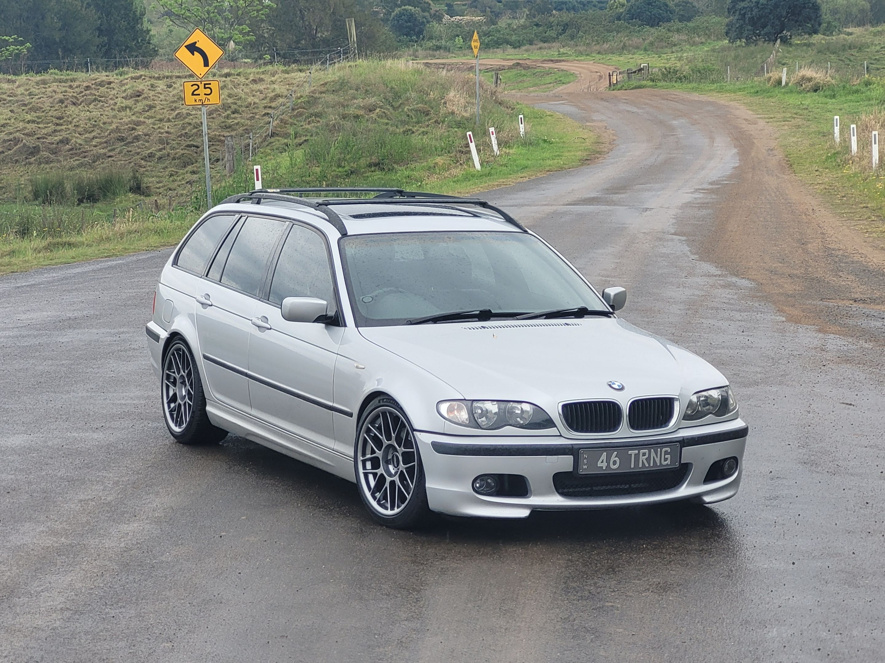 Silver BMW E46 3 Series with 18" ARC-8 Apex wheels in Hyper Black