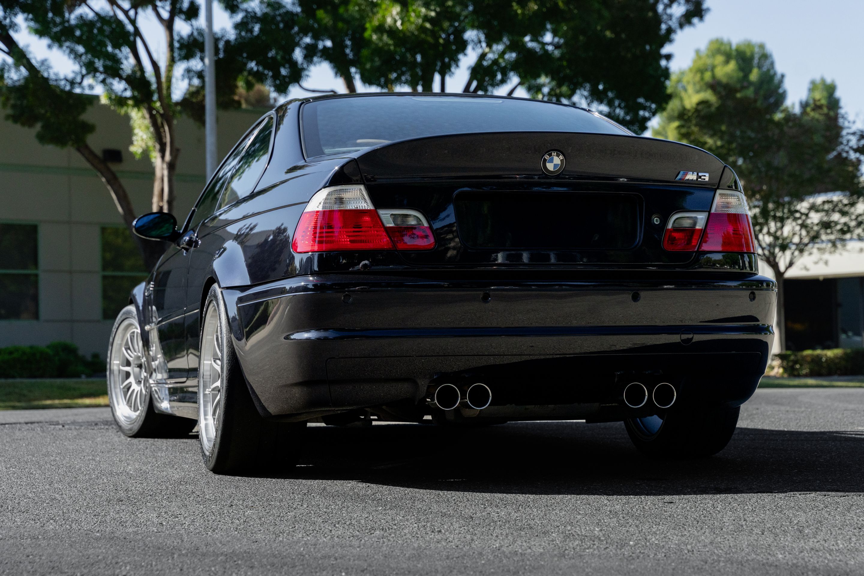 Black BMW E46 M3 with 18" SL-12 Apex wheels in Machined Lip Race Silver