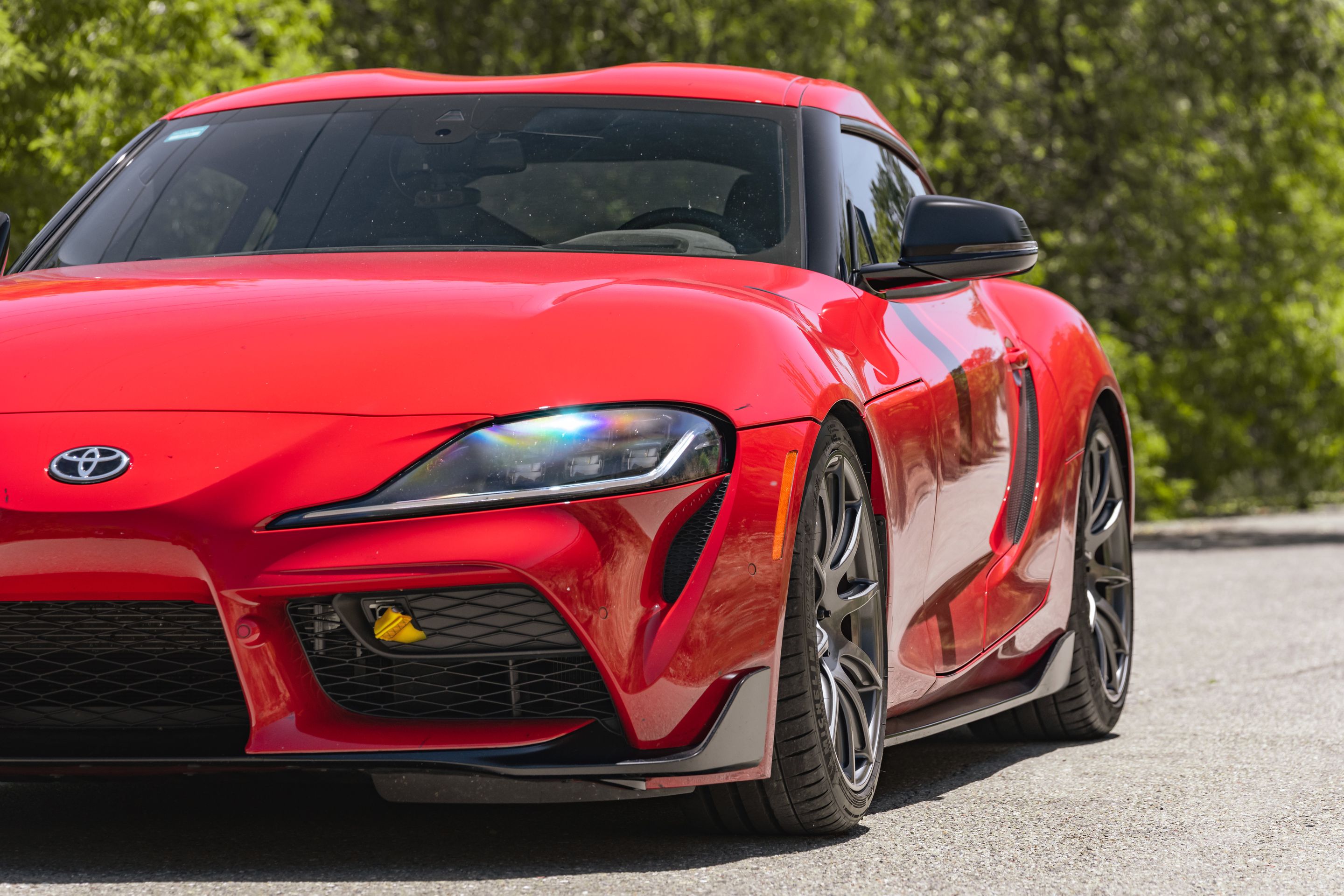 Red Toyota GR Supra with 19" SM-10 Apex wheels in Anthracite