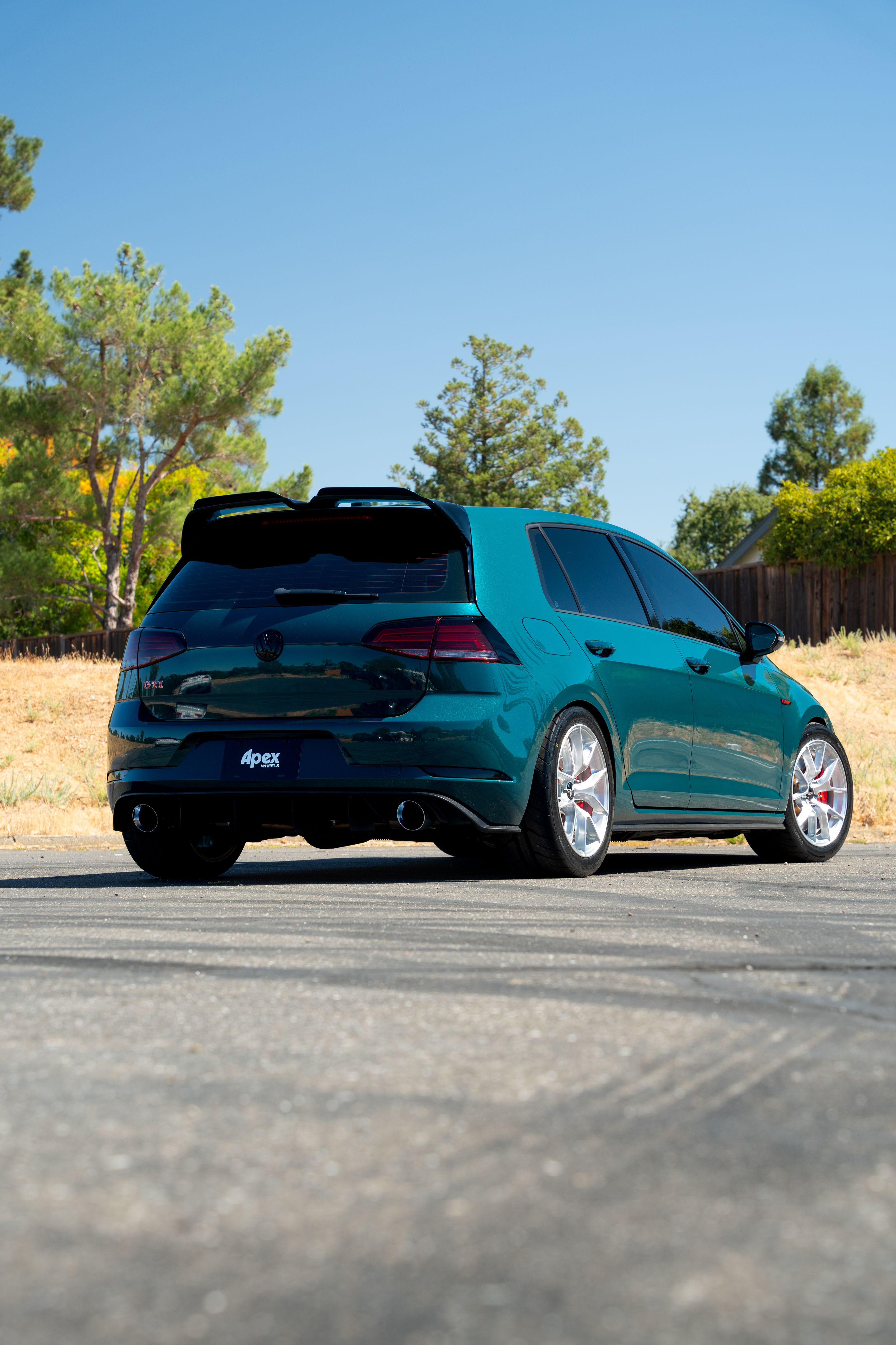 Green VW MK7 GTI with 17" VS-5RS Apex wheels in Brushed Clear