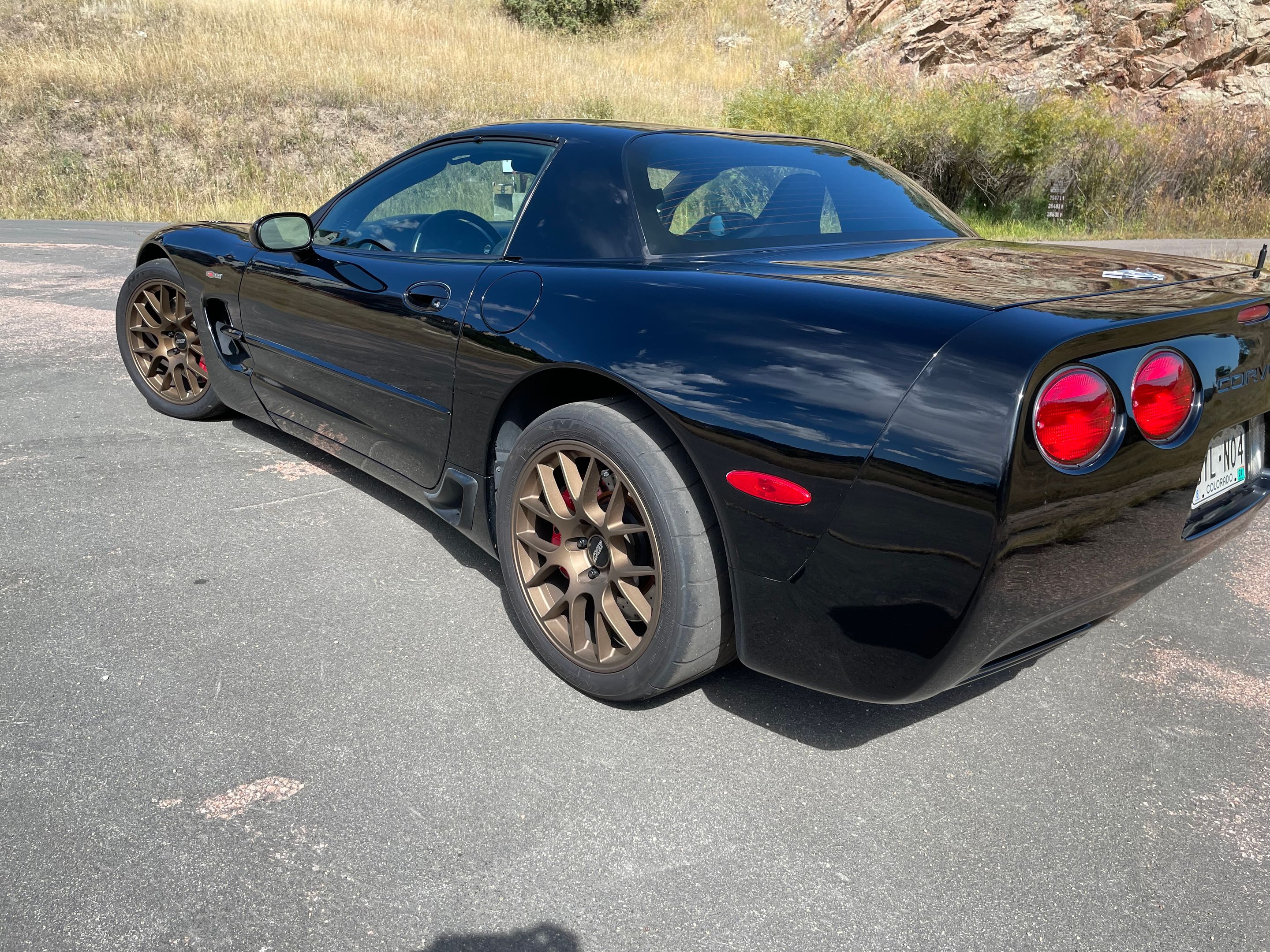 Black Chevrolet C5 Corvette Z06 with 18" EC-7 Apex wheels in Satin Bronze