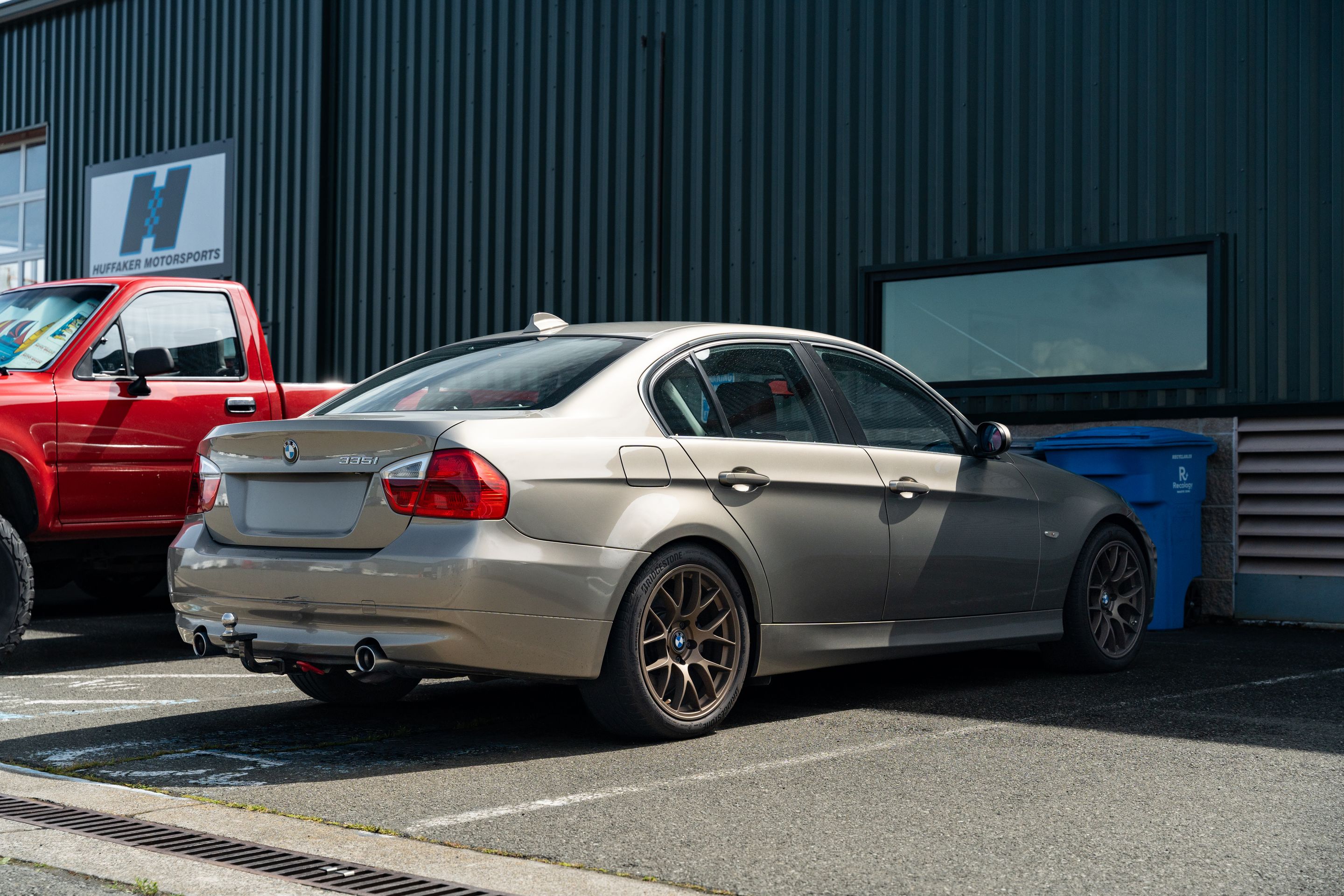 Silver BMW E90 Sedan 3 Series with 18" EC-7 Apex wheels in Satin Bronze