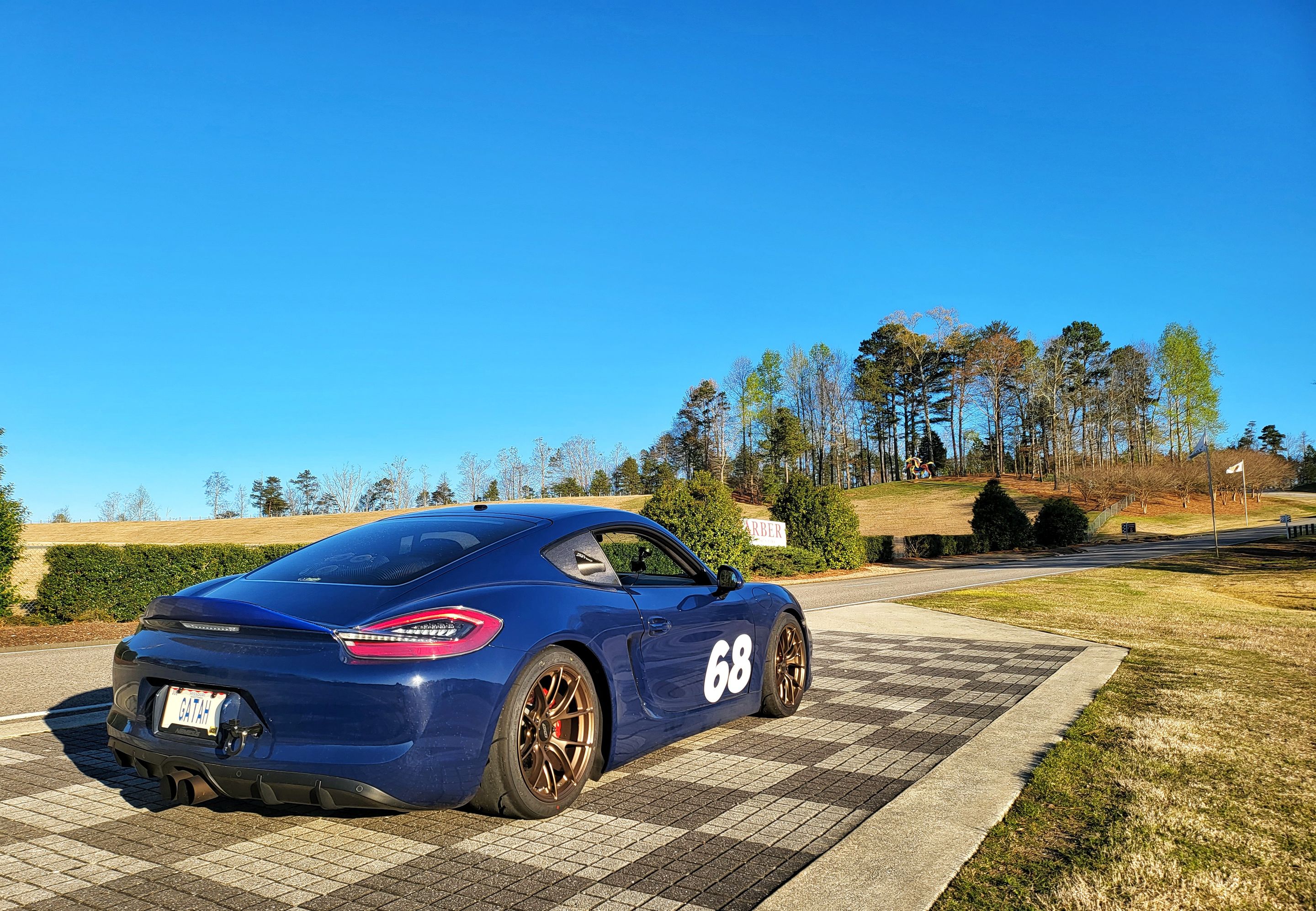 Blue Porsche 981 Cayman GTS with 18" VS-5RS Apex wheels in Satin Bronze