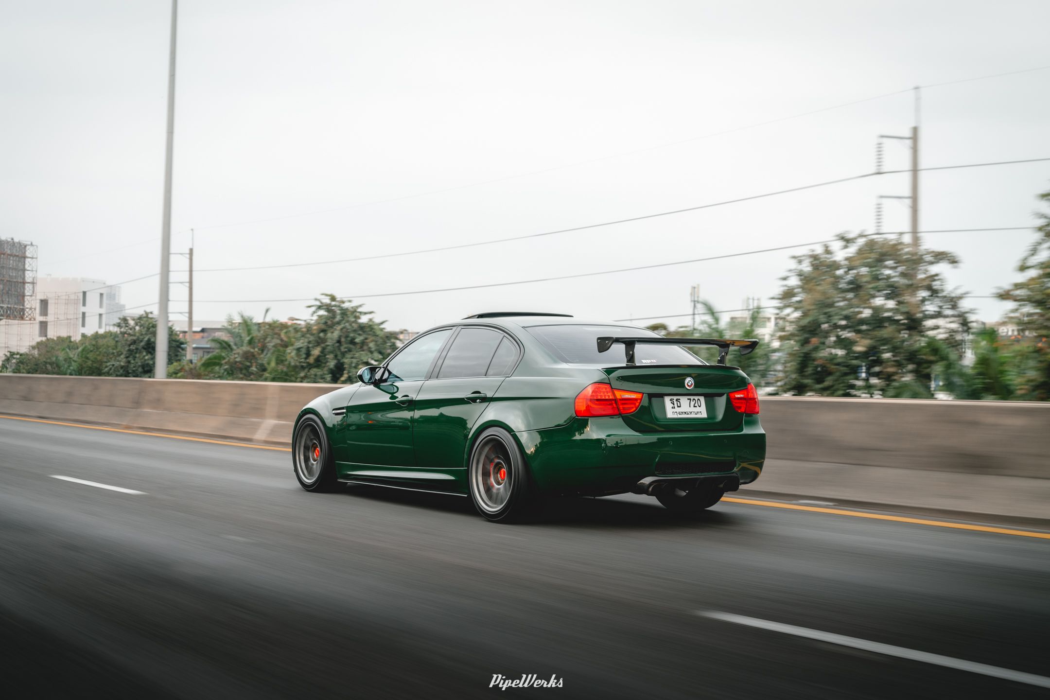 Green BMW E90 Sedan 3 Series with 18" ARC-8 Apex wheels in Anthracite