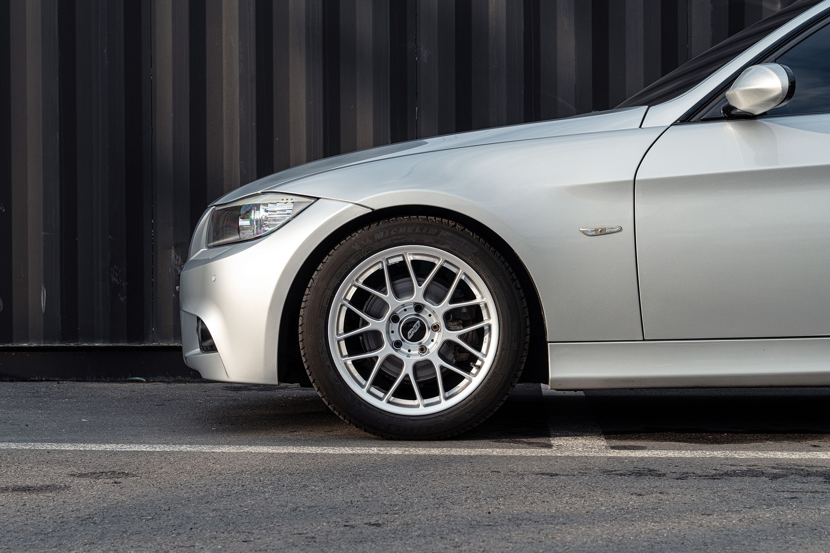 Silver BMW E90 Sedan 3 Series with 17" ARC-8 Apex wheels in Hyper Silver