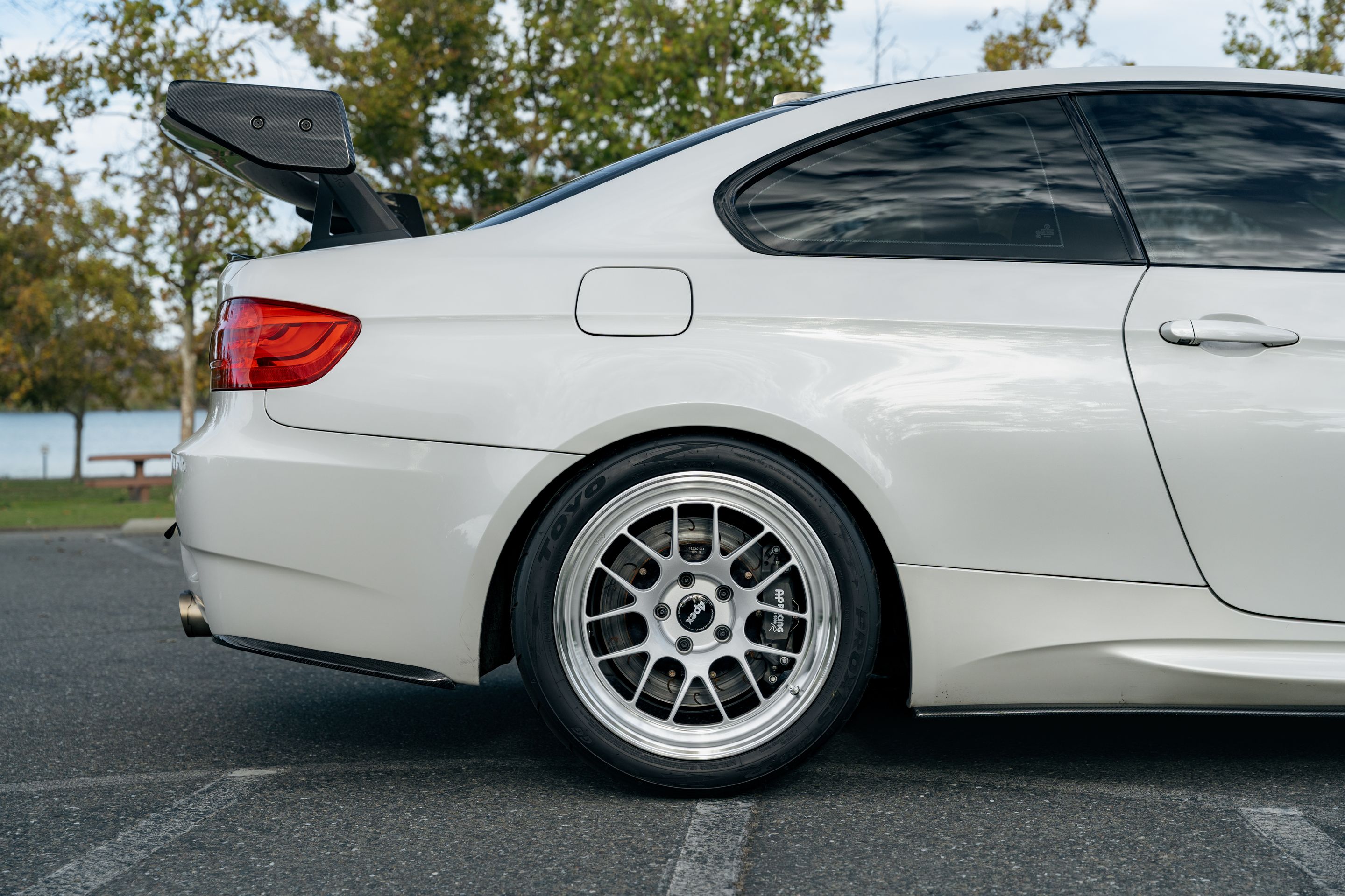 White BMW E92 Coupe M3 with 18" ML-7RT Apex wheels in Machined Lip Race Silver