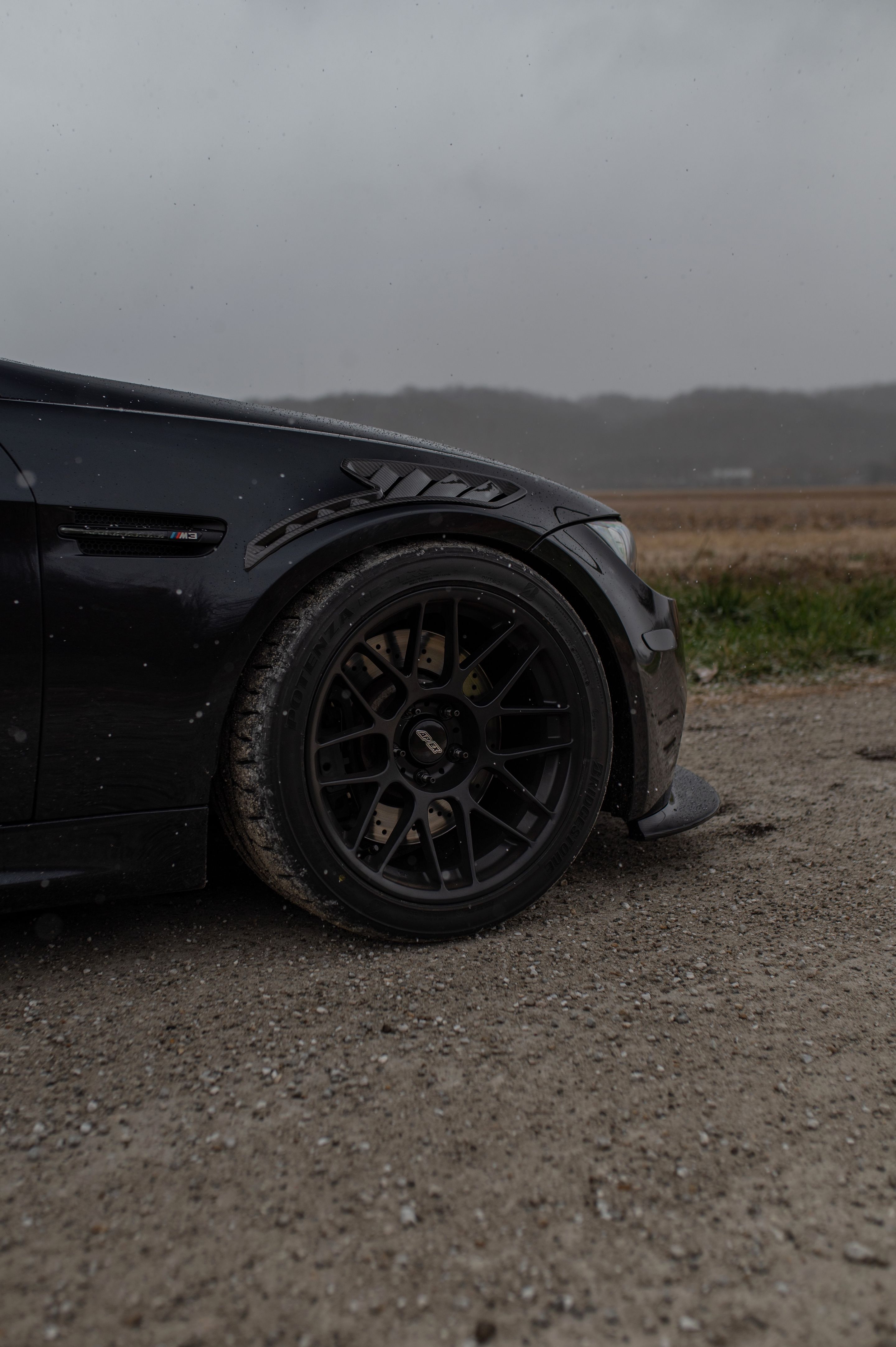 Black BMW E90 Sedan M3 with 18" ARC-8 Apex wheels in Satin Black