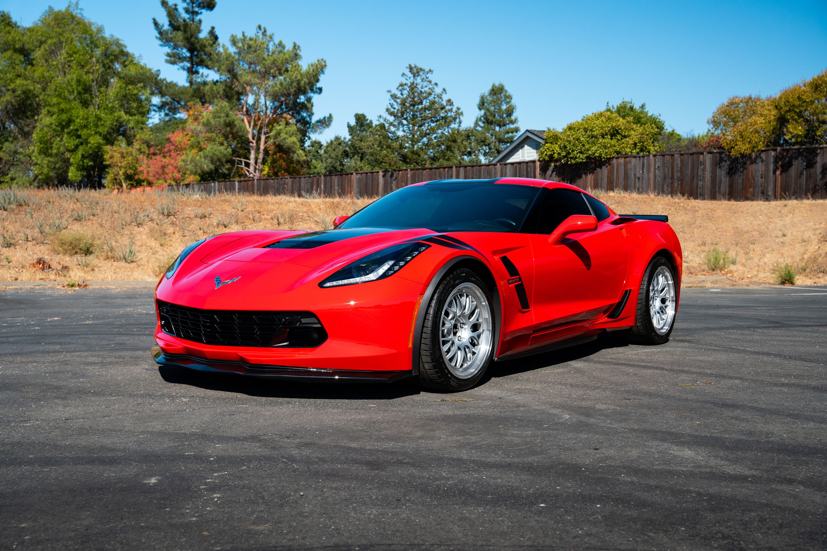 Red Chevrolet C7 Corvette Grand Sport with 18"/19" ML-10RT Apex wheels in Machined Lip Race Silver