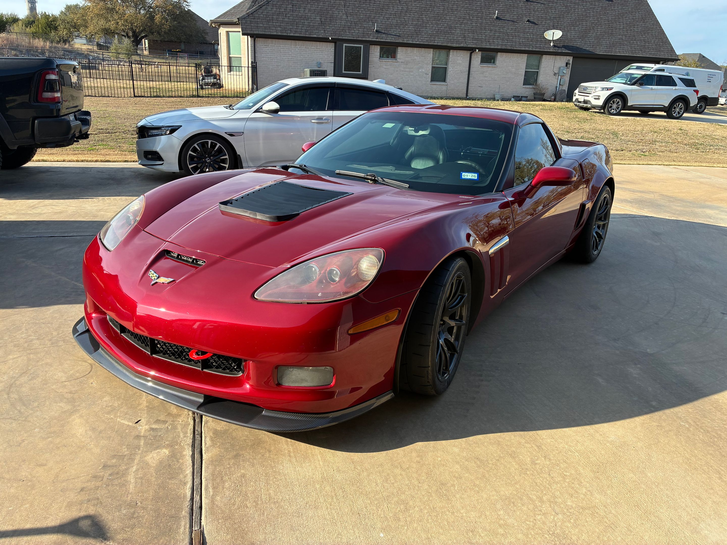 Red Chevrolet C6 Corvette Grand Sport with 18" SM-10 Apex wheels in Machined Lip Anthracite
