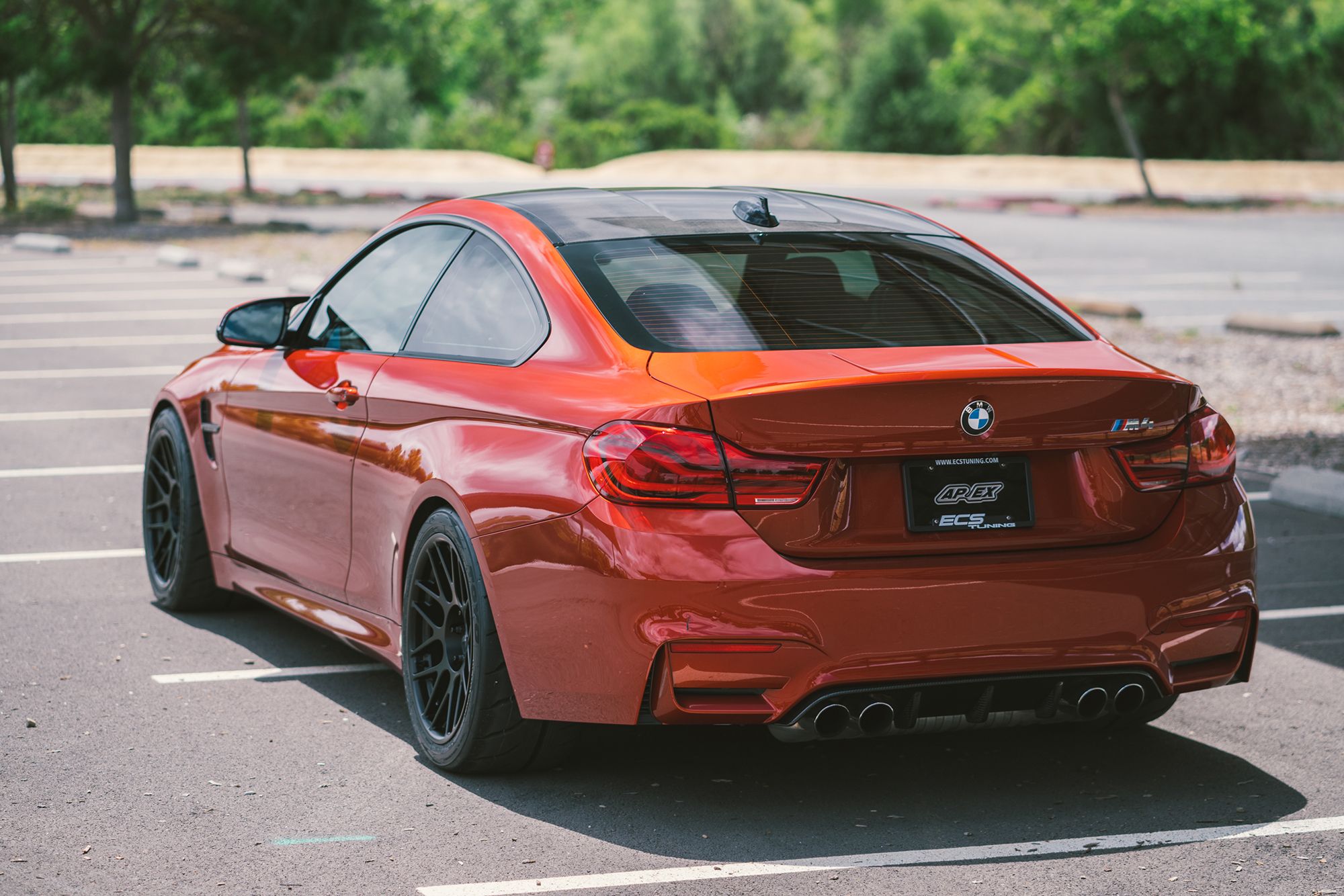 Red BMW F82 Coupe M4 with 18" ARC-8R Apex wheels in Satin Black
