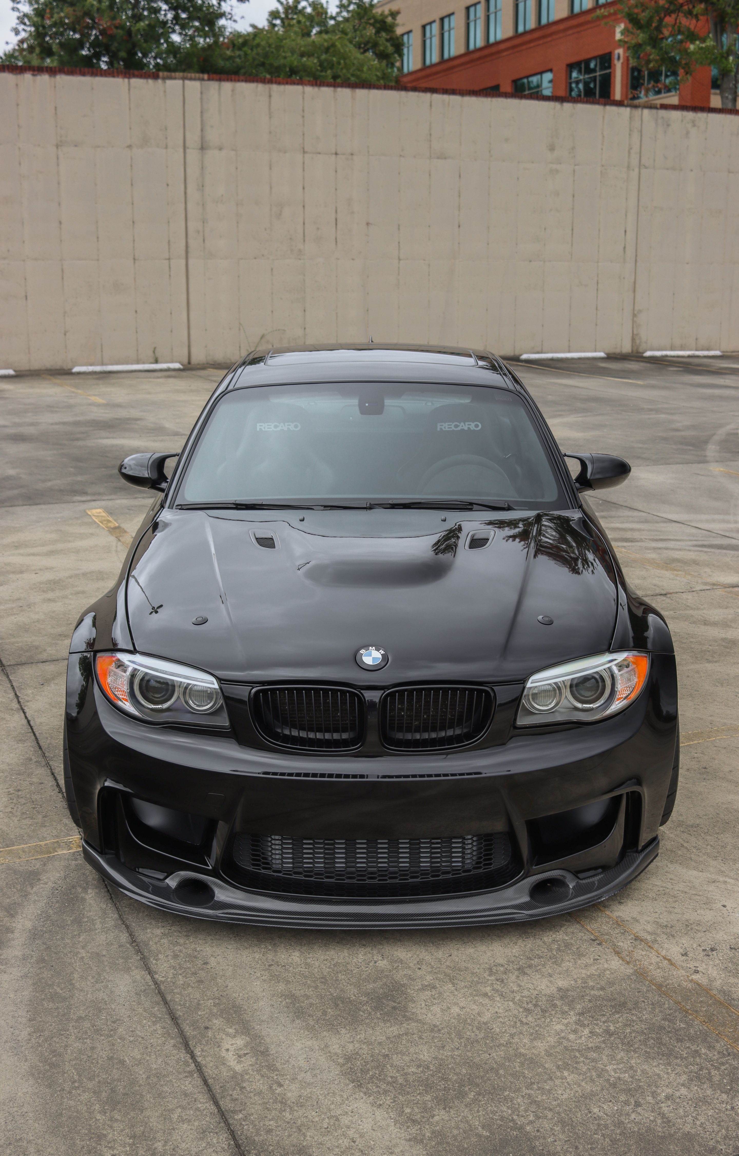 Black BMW E82 1M with 18" VS-5RS Apex wheels in Satin Black