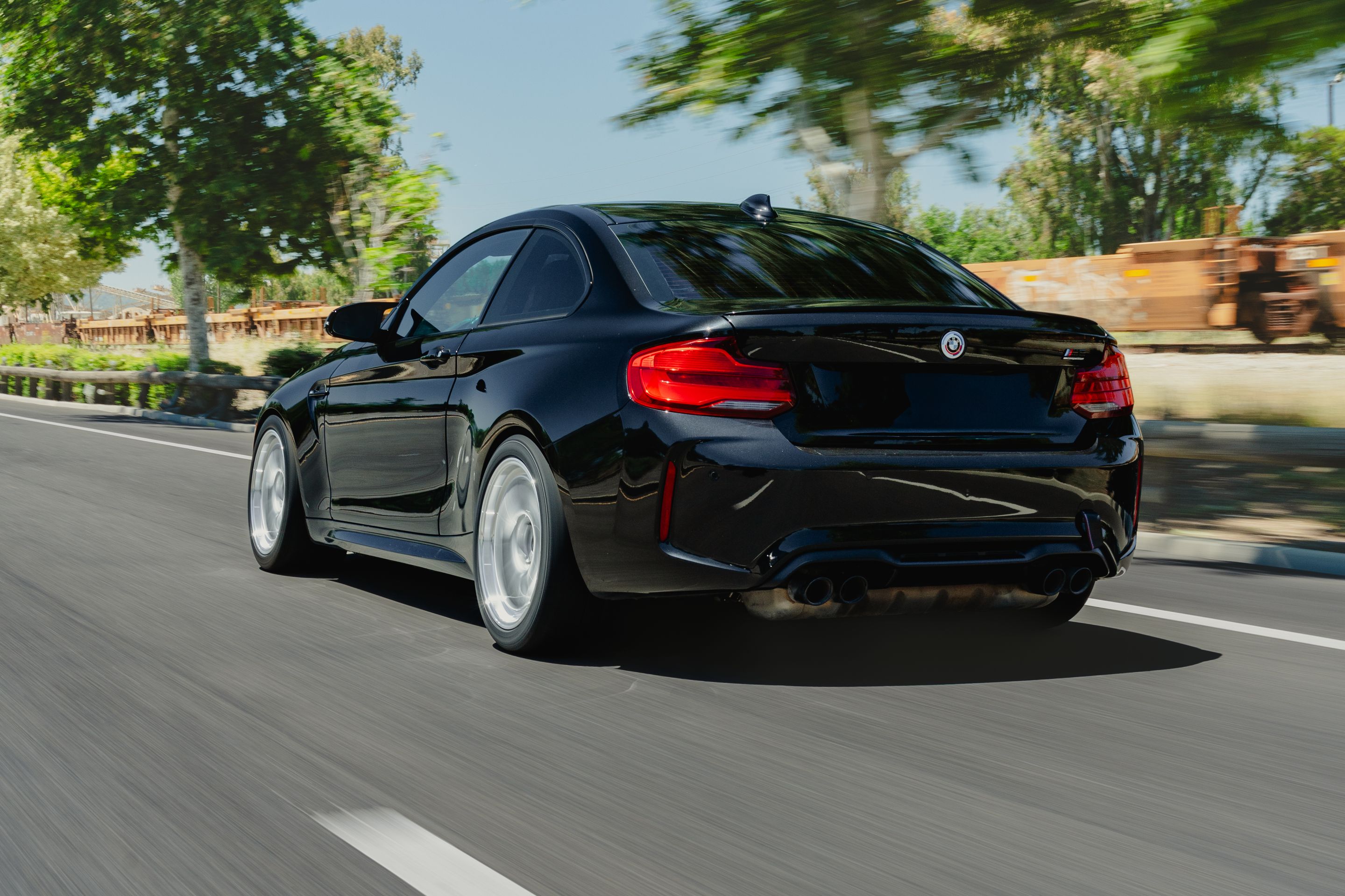 Black BMW F87 M2 with 18" ML-7RT Apex wheels in Machined Lip Race Silver