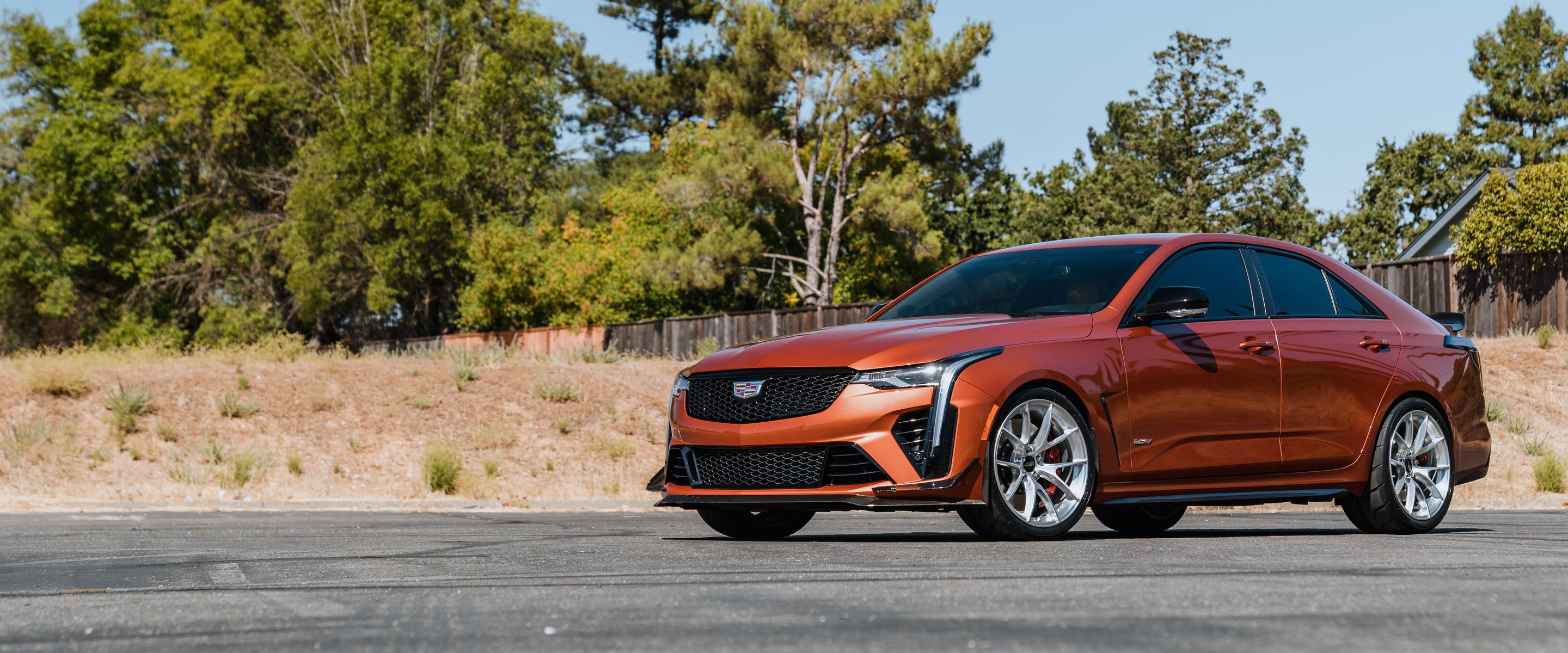 Orange Cadillac CT4-V Blackwing with 19" VS-5RS Apex wheels in Brushed Clear