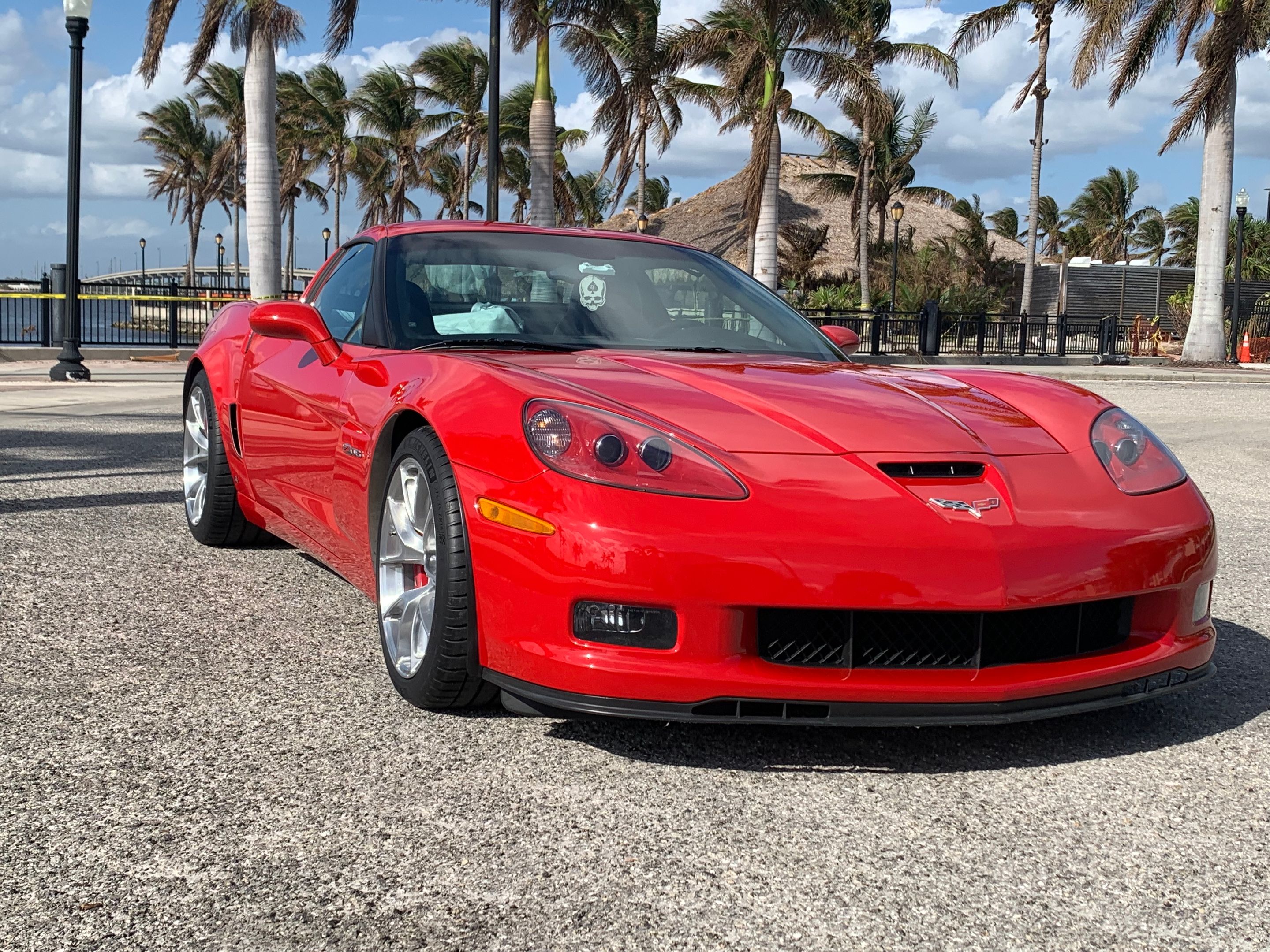 Red Chevrolet C6 Corvette Z06 with 18"/19" VS-5RS Apex wheels in Brushed Clear