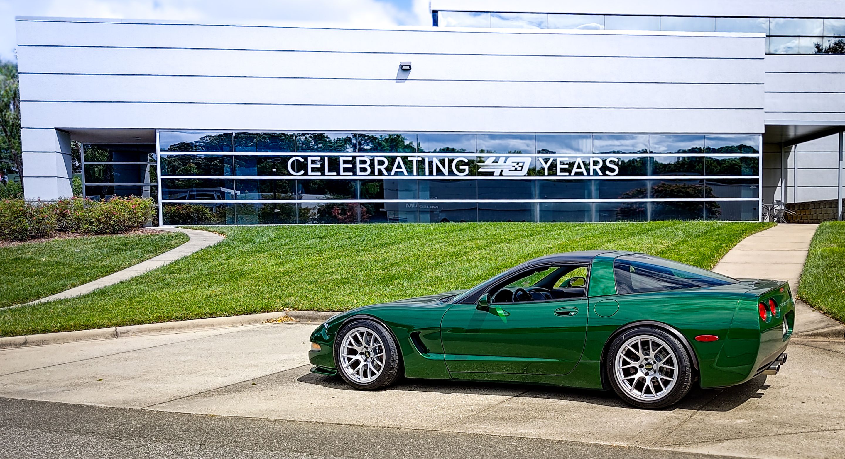 Green Chevrolet C5 Corvette Base/Z51 with 18" EC-7 Apex wheels in Race Silver