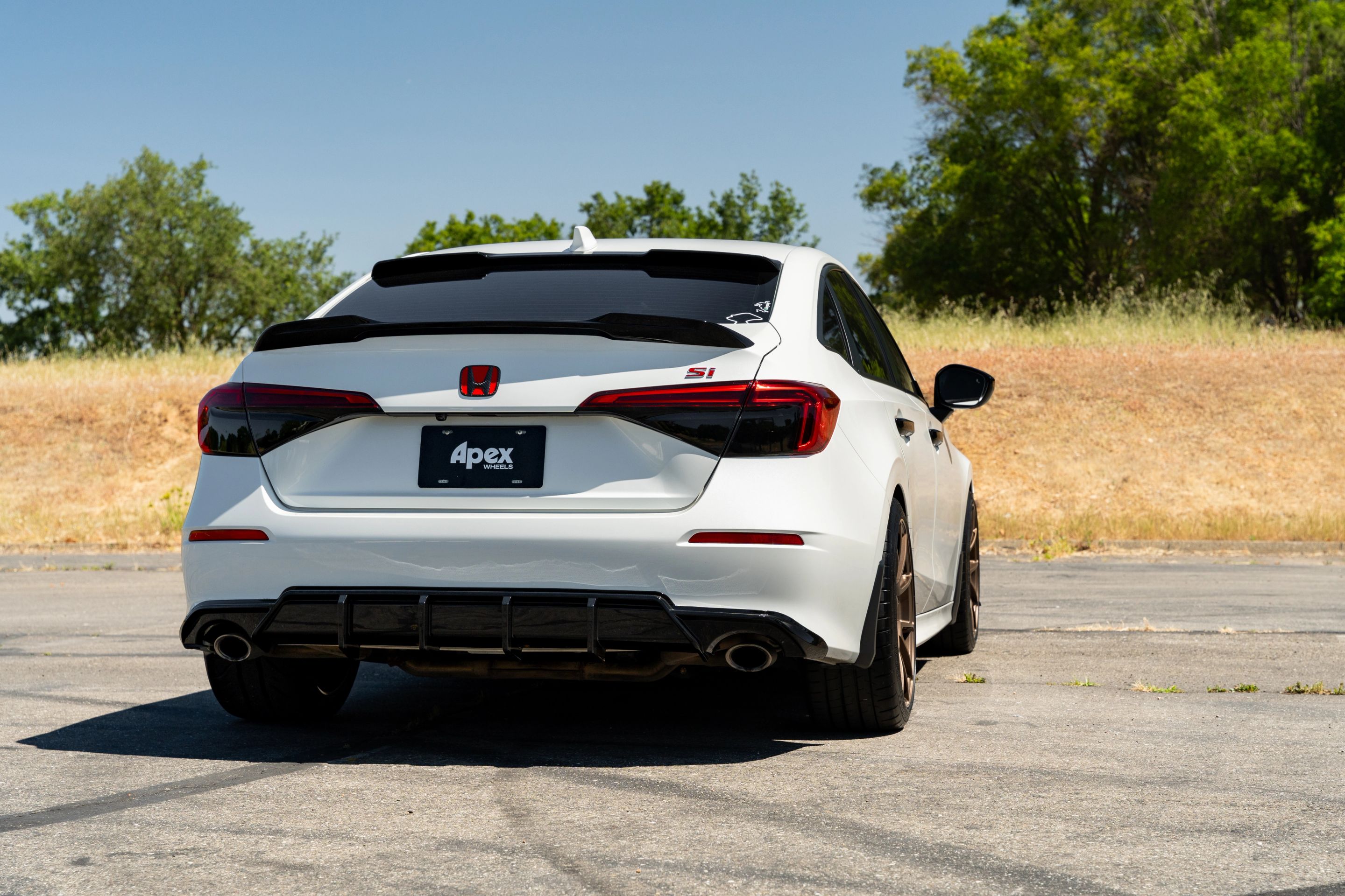 White Honda 11th Gen Civic with 18" VS-5 Apex wheels in Satin Bronze