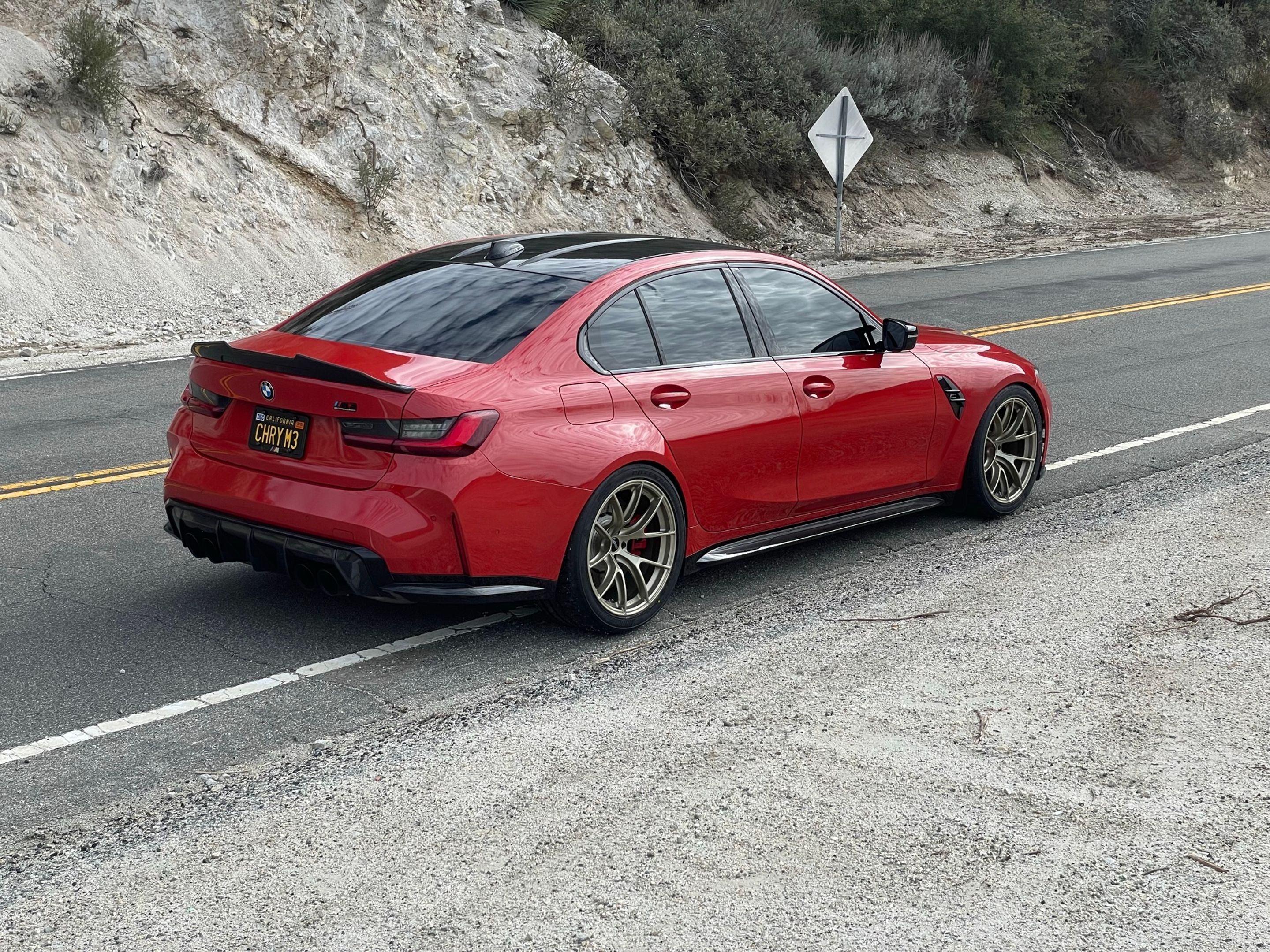 Red BMW G80 M3 with 19" VS-5RS Apex wheels in Motorsport Gold