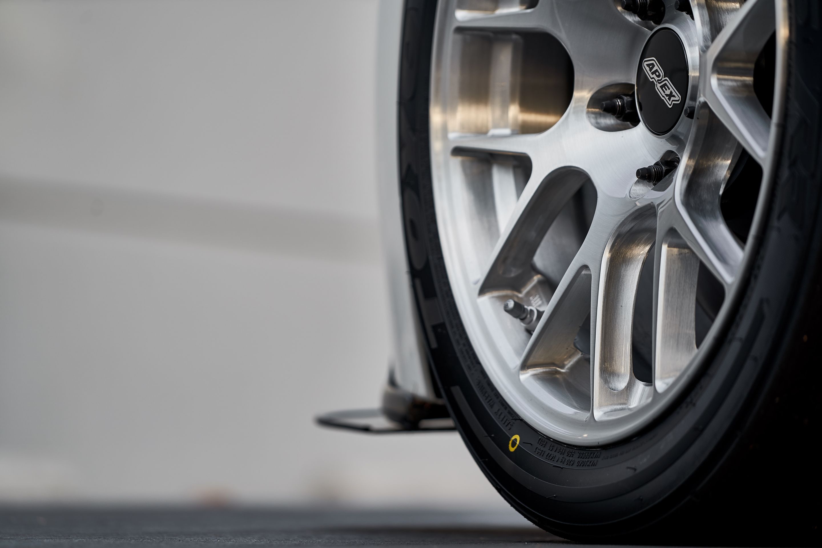 White BMW E90 LCI Sedan 3 Series with 17" EC-7R Apex wheels in Brushed Clear