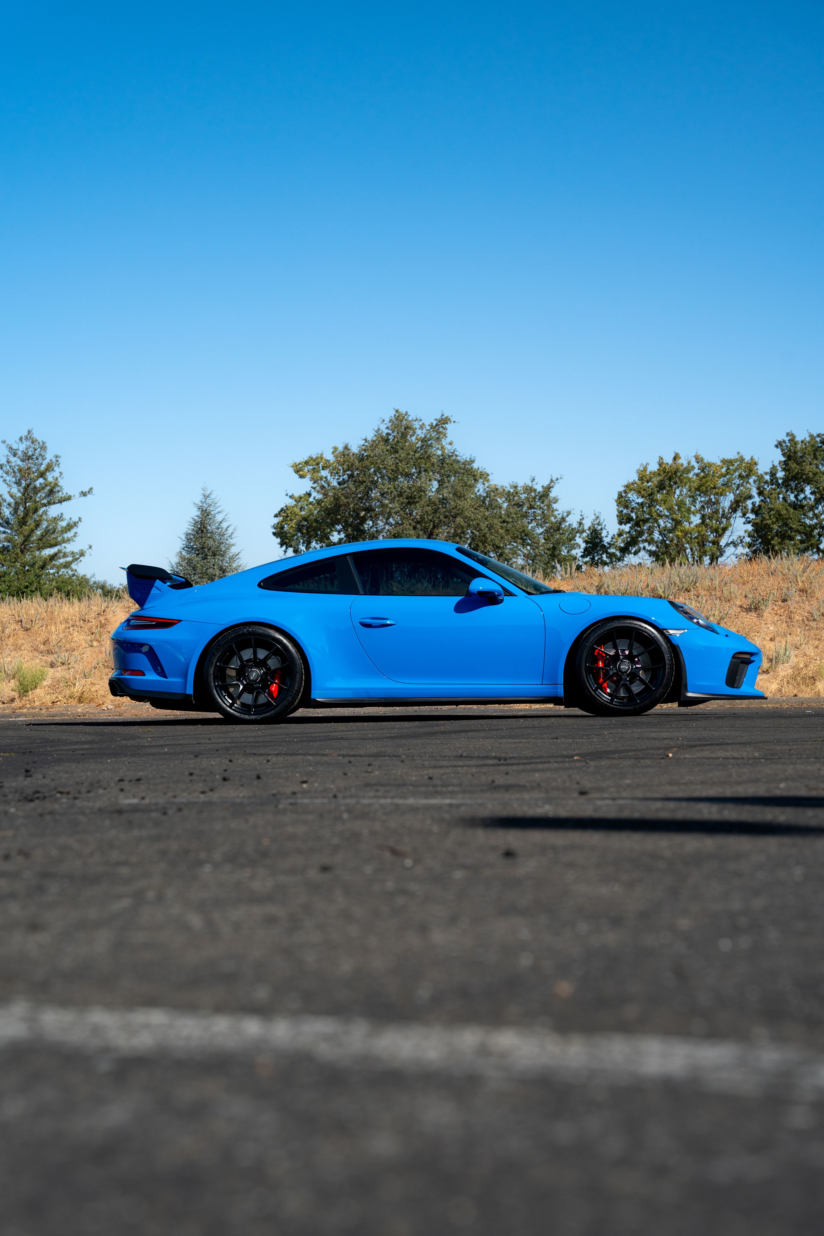 Blue Porsche 911 991.2 GT3 with 19" VS-5RE Apex wheels in Satin Black
