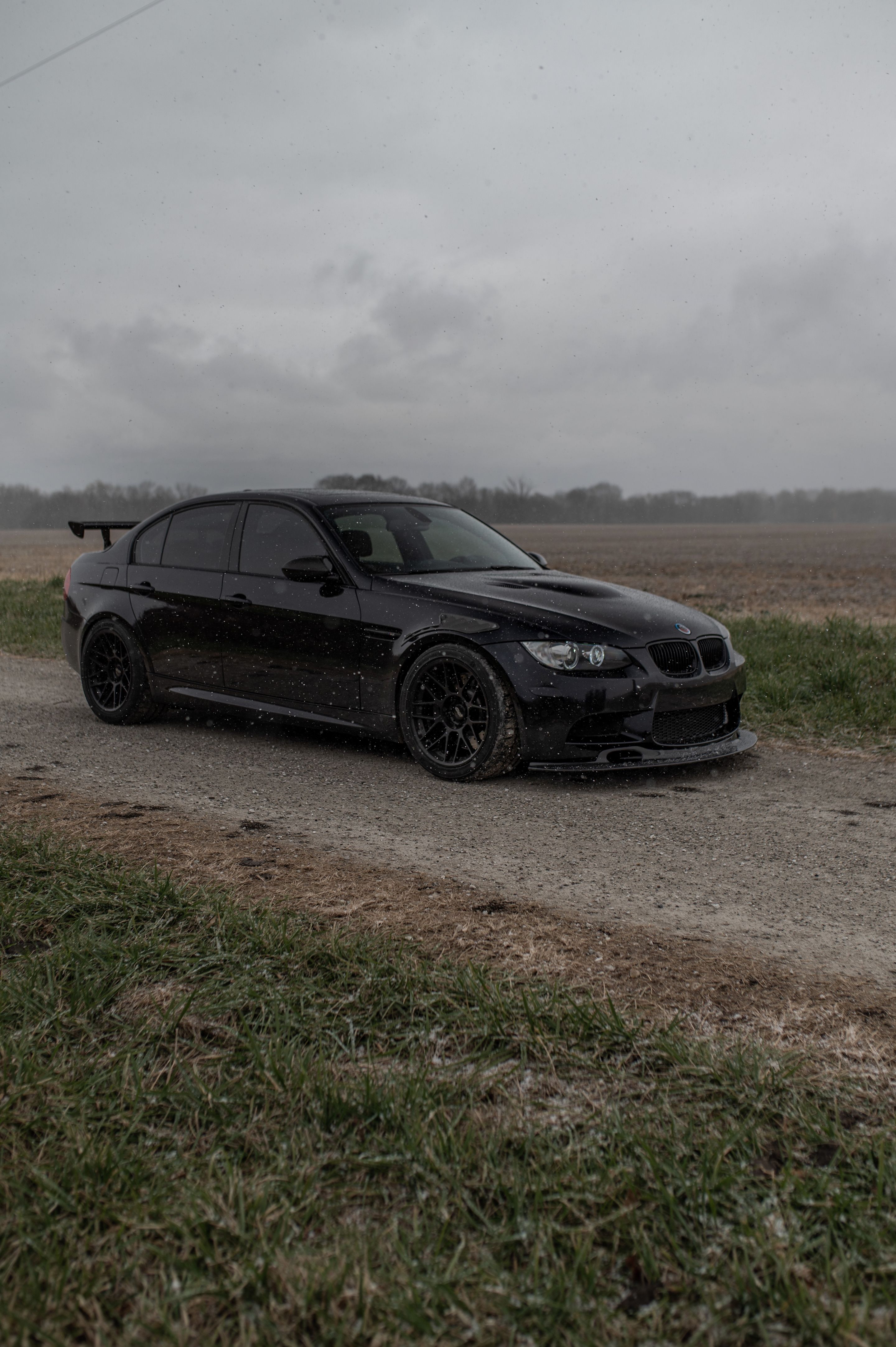 Black BMW E90 Sedan M3 with 18" ARC-8 Apex wheels in Satin Black
