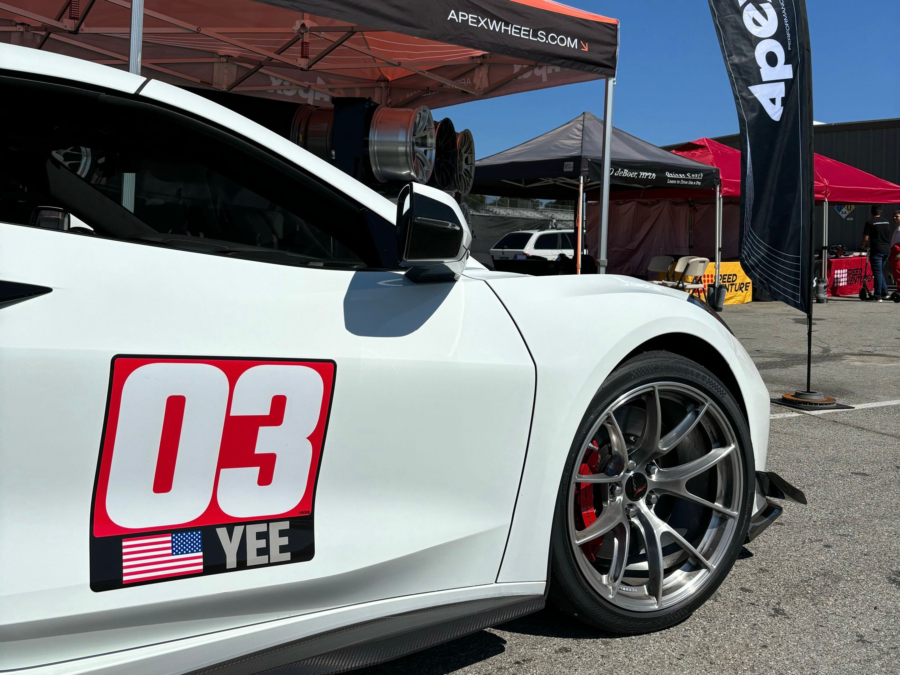 White Chevrolet C8 Corvette Z06 with 19" VS-5RS Apex wheels in Brushed Clear