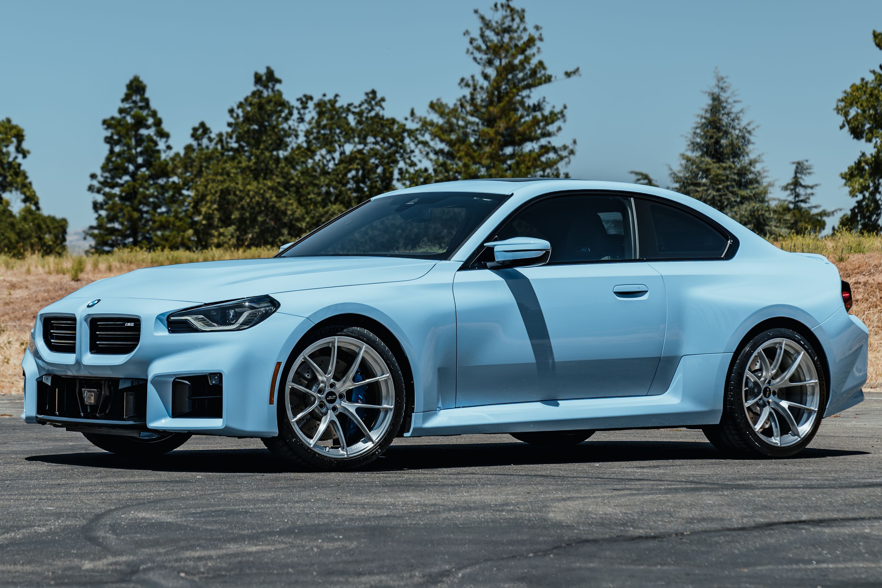 Blue BMW G87 M2 with 20" VS-5RS Apex wheels in Brushed Clear