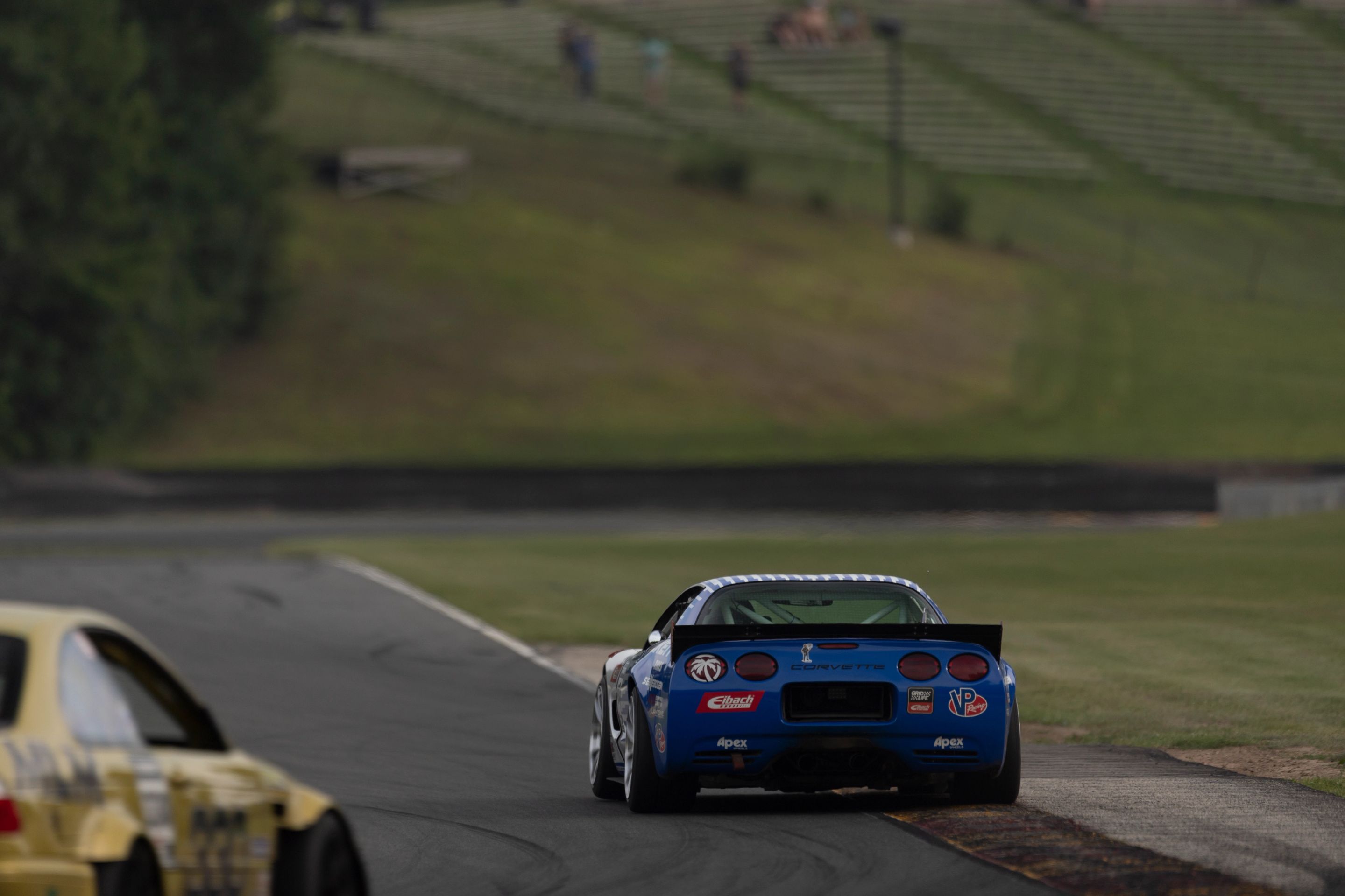 White Chevrolet C5 Corvette Z06 with 19" VS-5RS Apex wheels in Brushed Clear