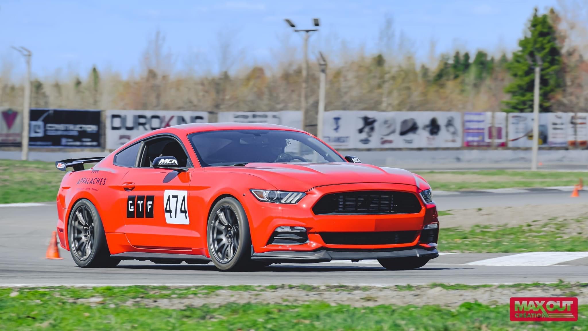 Red Ford S550 Mustang GT with 18" SM-10 Apex wheels in Anthracite