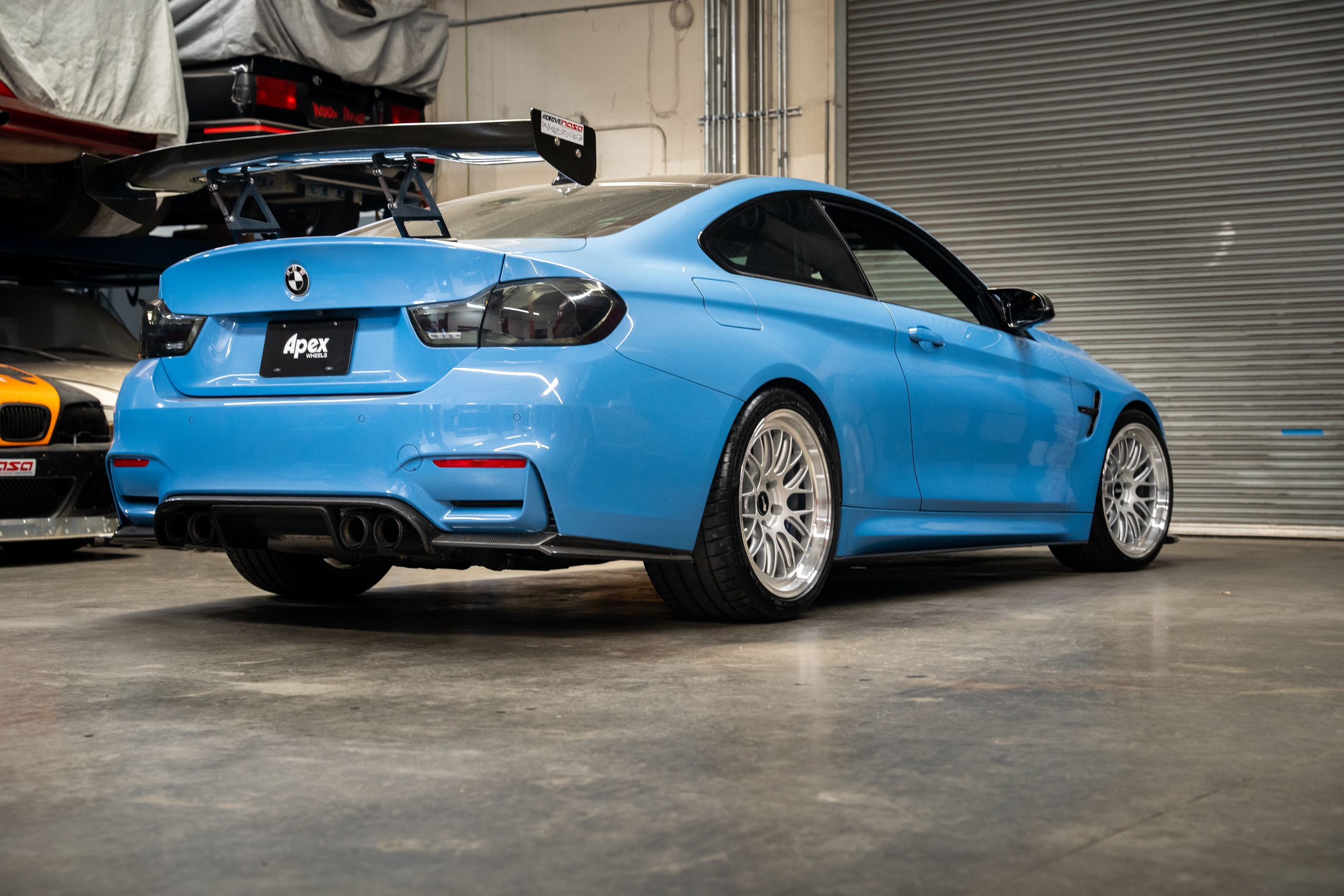 Blue BMW F82 Coupe M4 with 19" ML-10RT Apex wheels in Machined Lip Race Silver