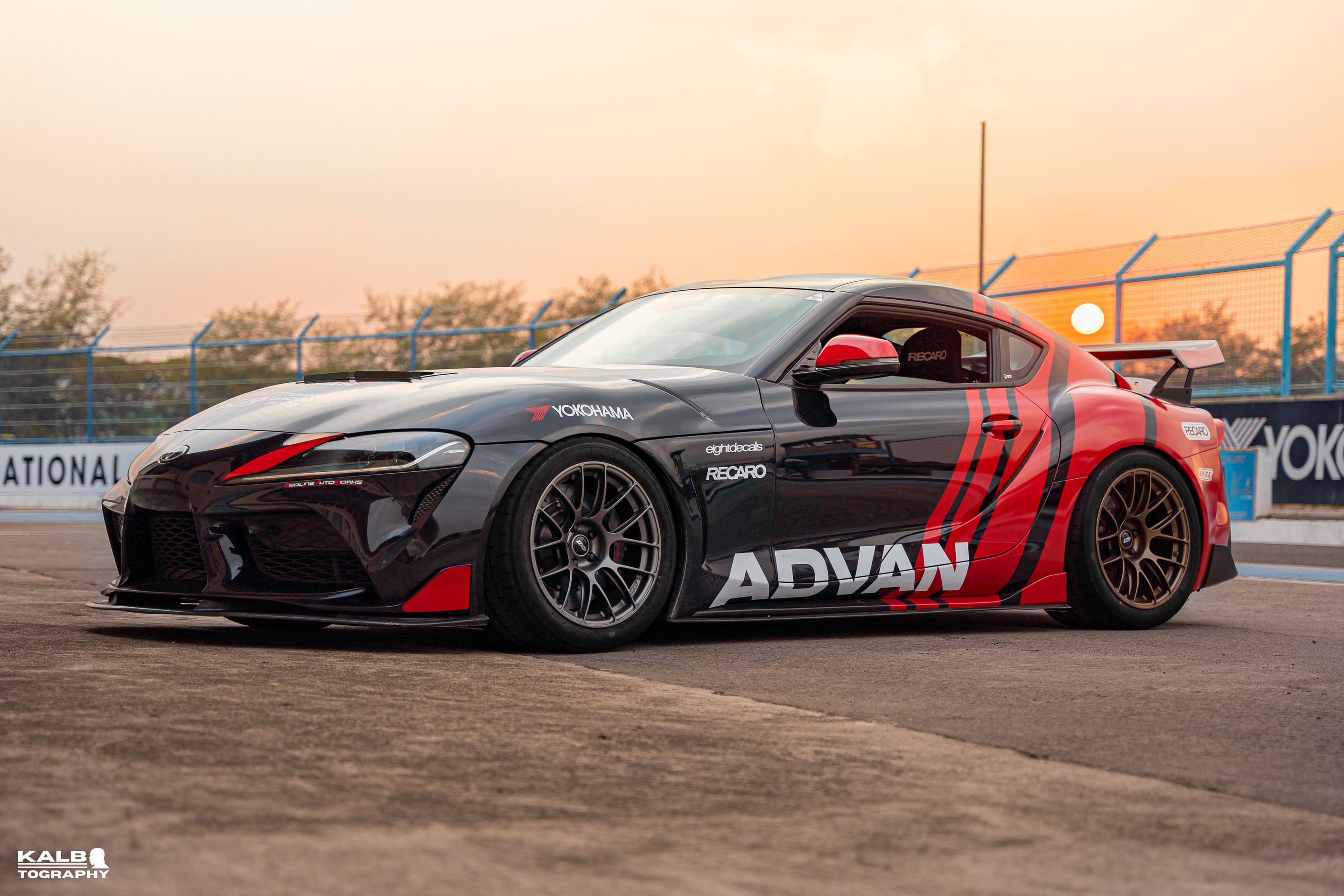Black Toyota GR Supra with 18" EC-7RS Apex wheels in Satin Bronze