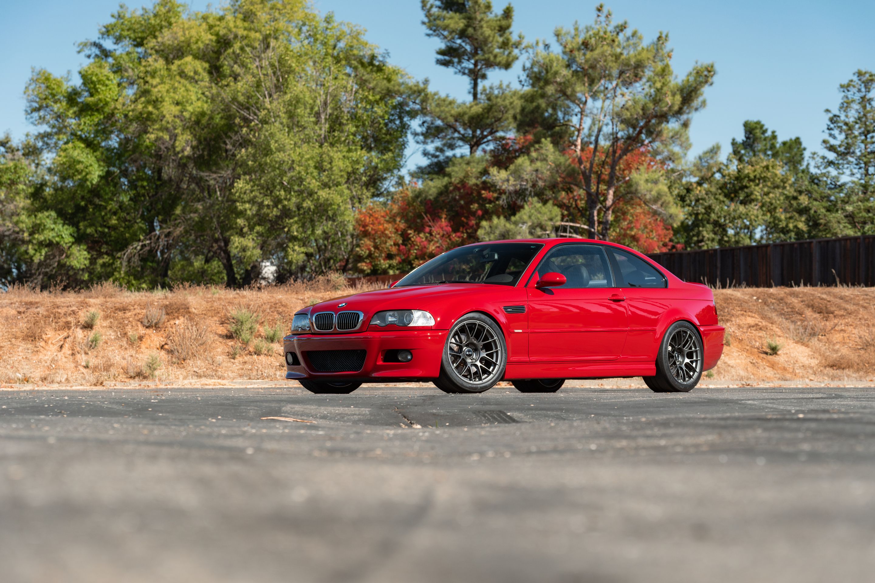 Red BMW E46 M3 with 18" EC-7RS Apex wheels in Anthracite